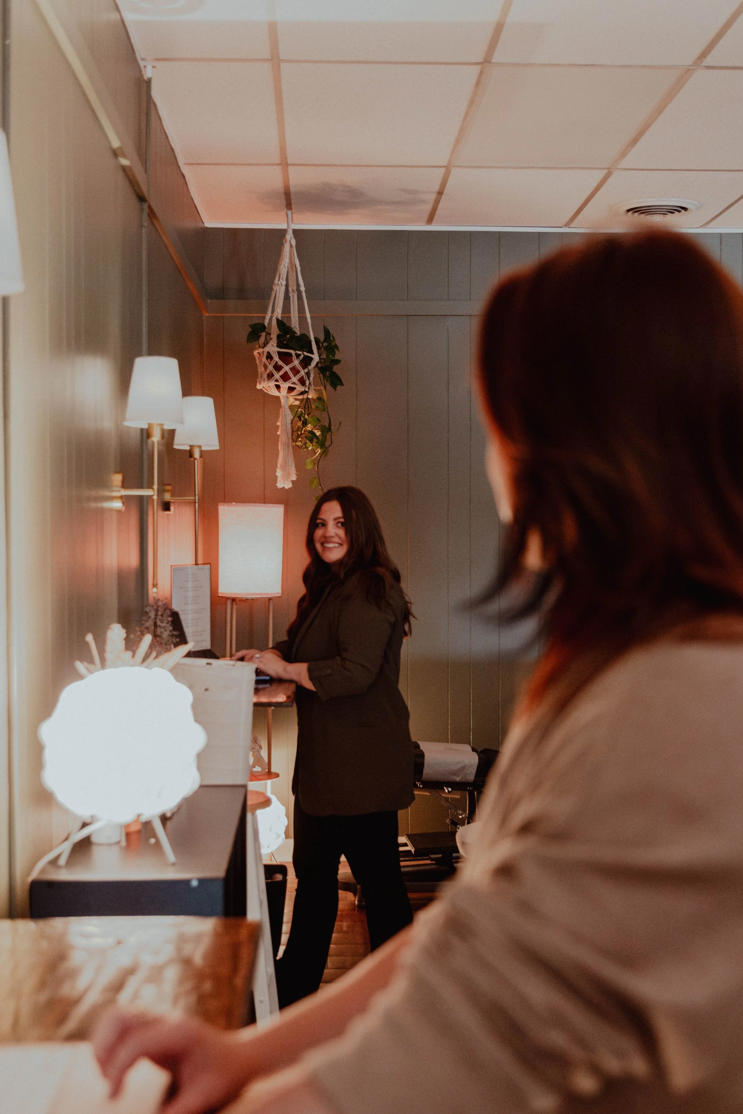 	
A patient receiving a Gonstead chiropractic exam by Dr. Victoria
