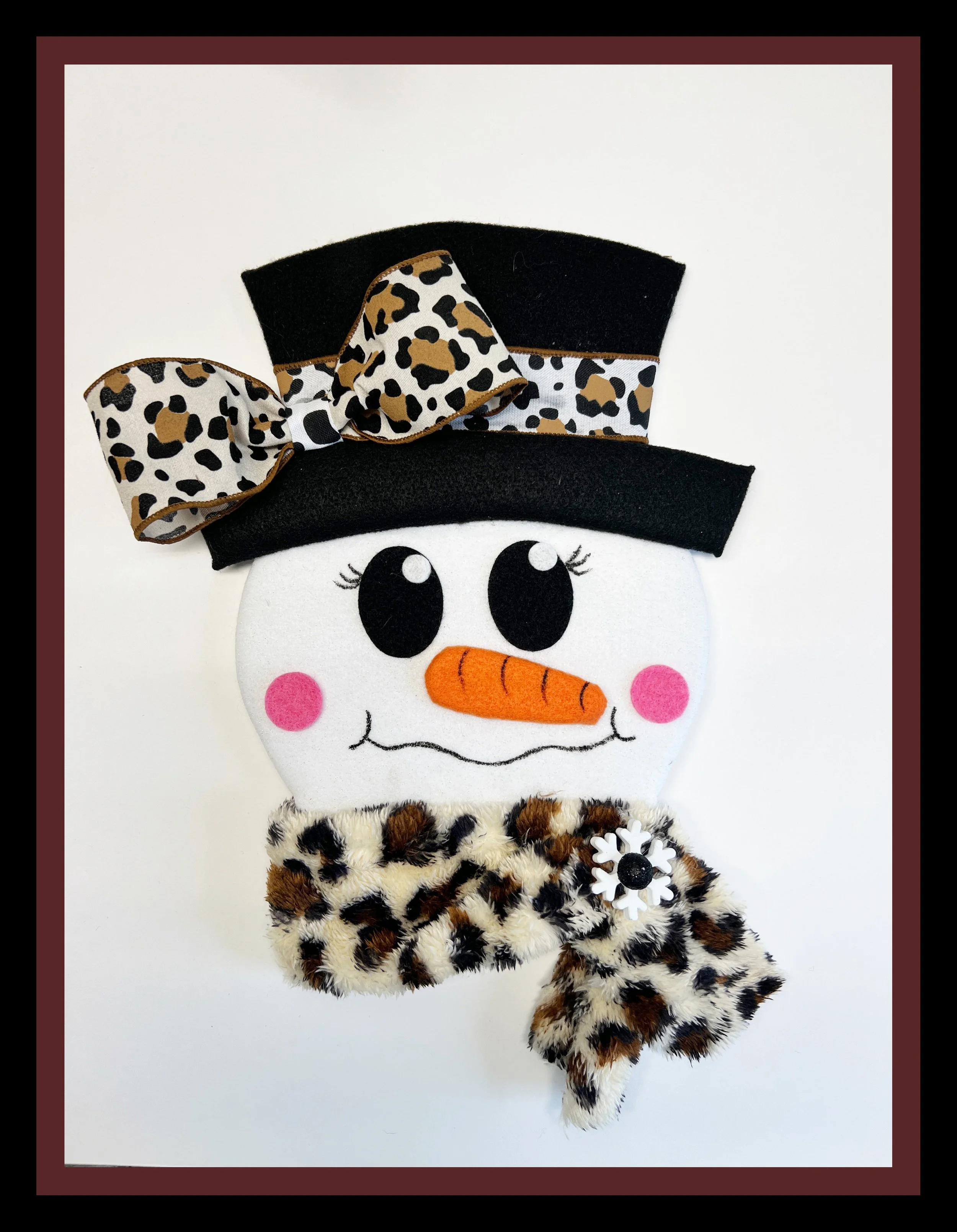 Leopard snowman.jpeg