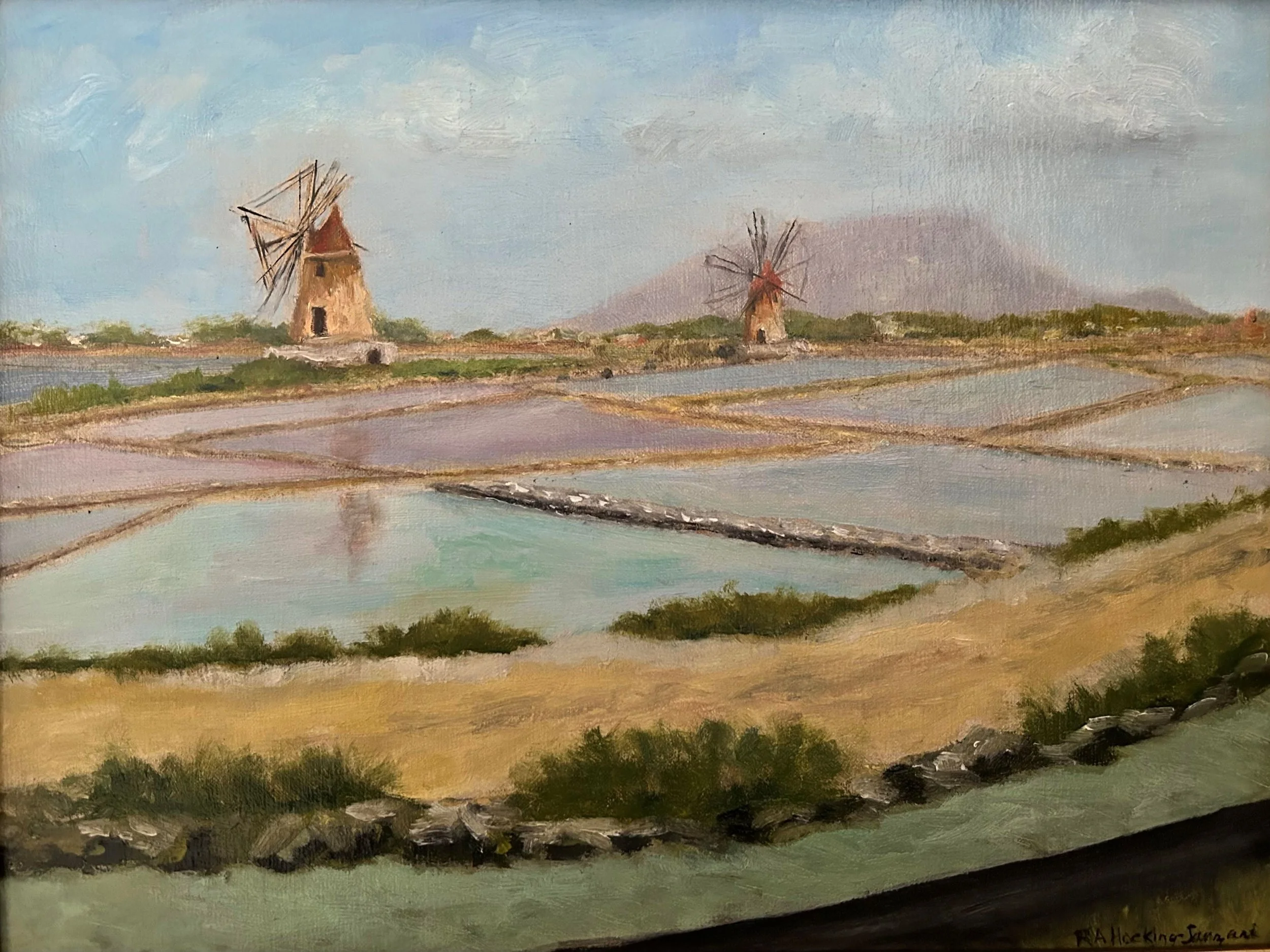Painting of a rural landscape featuring two windmills, ponds, and a mountain in the background, with a cloudy sky.