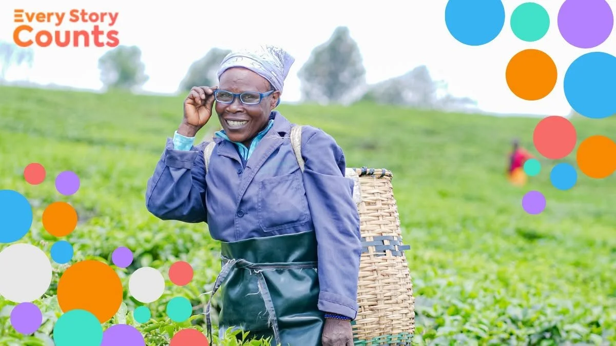 Woman in tea field wearing glasses, smiling — World Sight Day 'Every Story Counts' campaign image