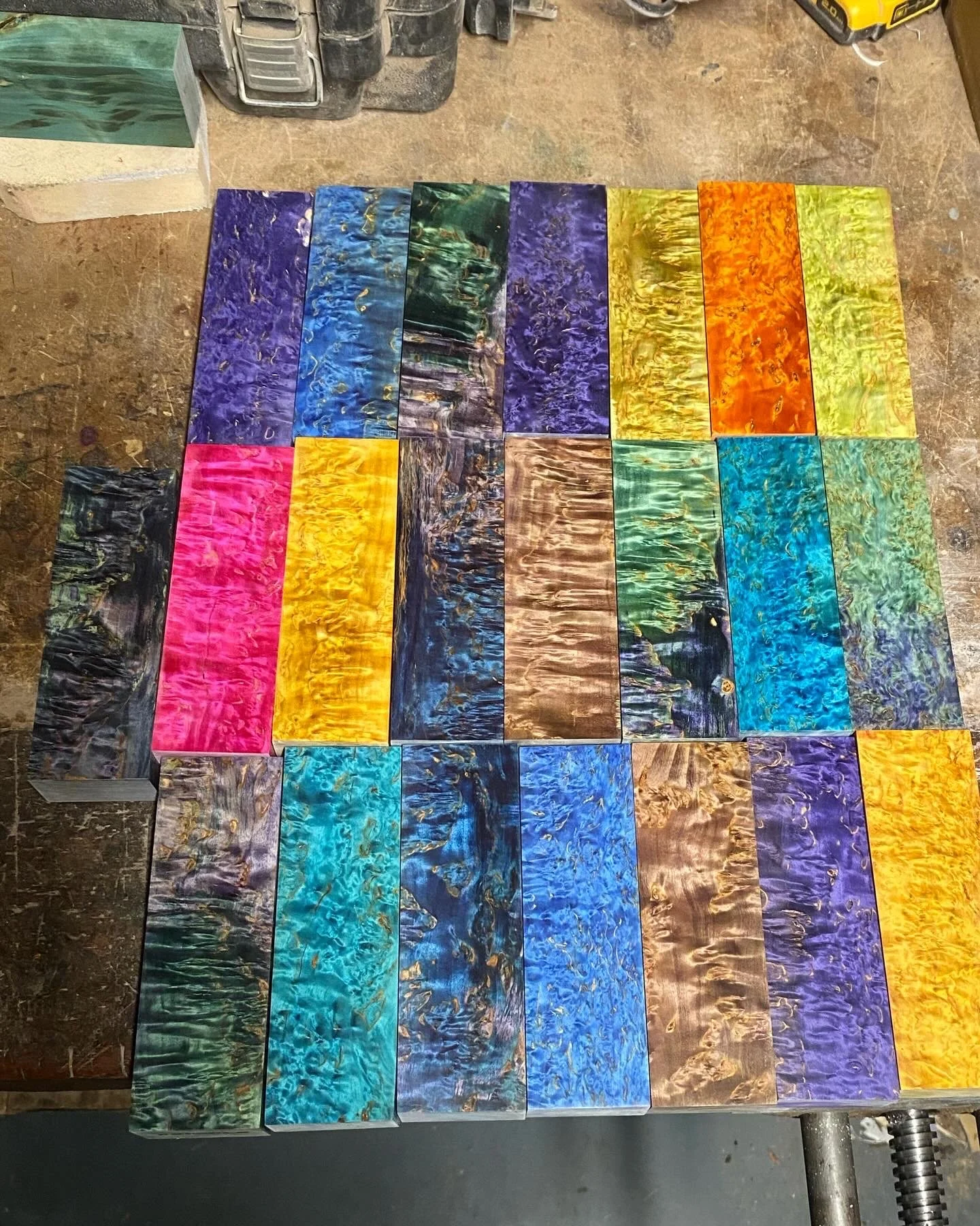 Colorful wood blanks arranged on a workbench