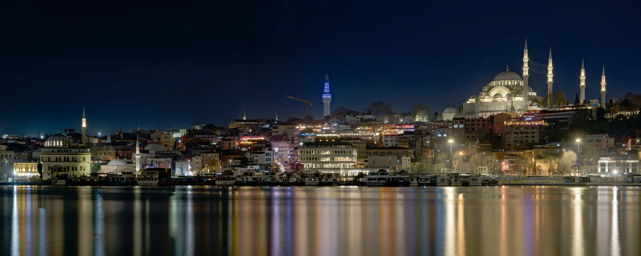 Night panorama of waterfront, Istanbul, Turkiye.  Photograph by Douglas Seigars.