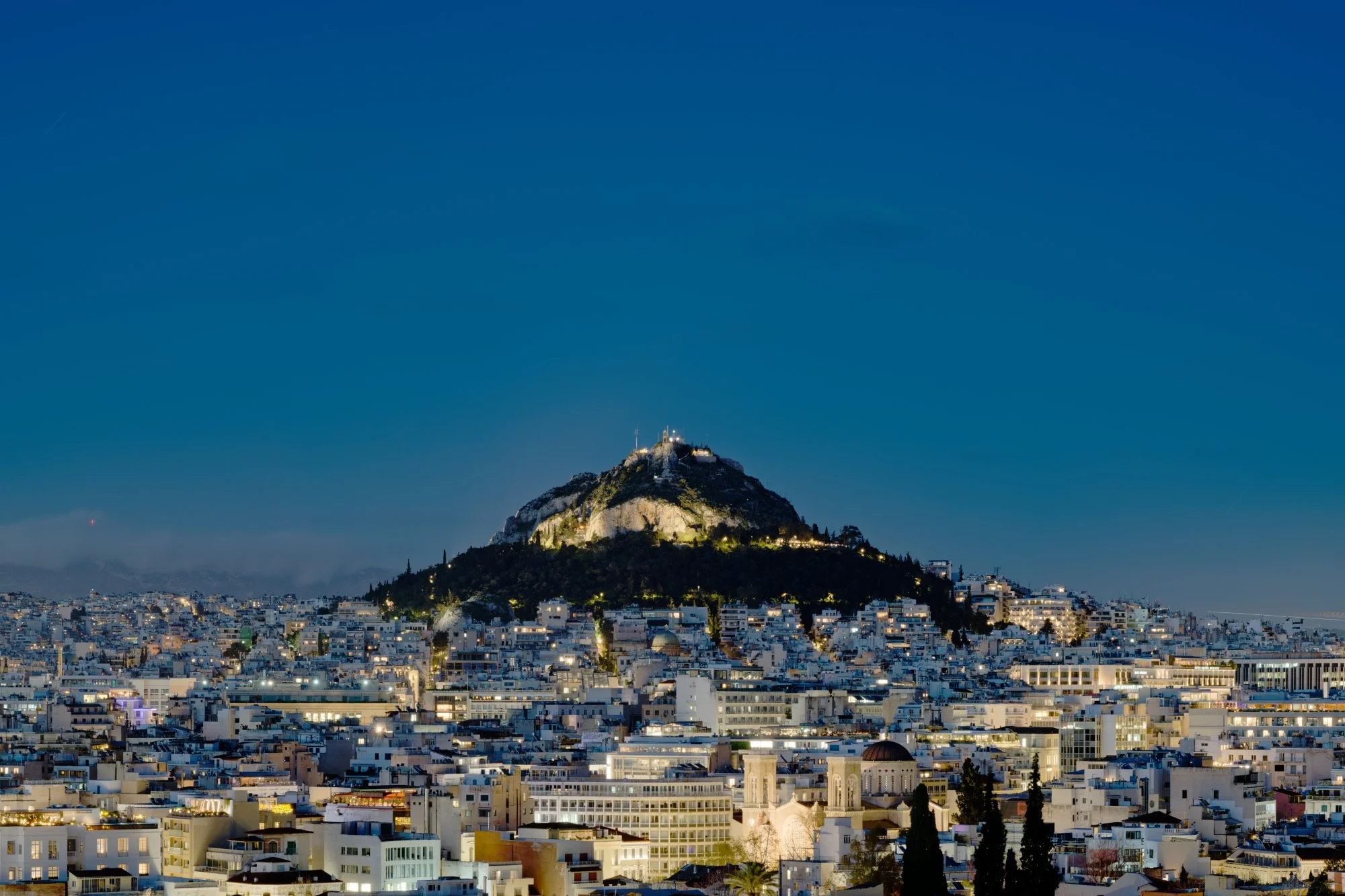 Lycabettus Hill at dusk, Athens, Greece.  Photograph by Douglas Seigars.