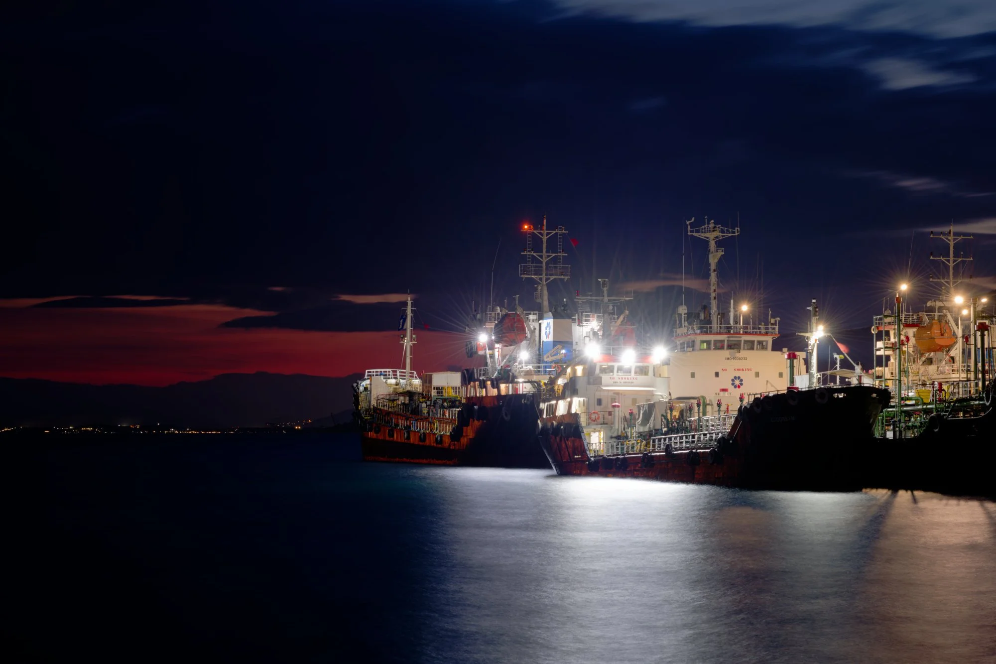 Coastal ships at night, Elefsina, Greece.  Photograph by Douglas Seigars.