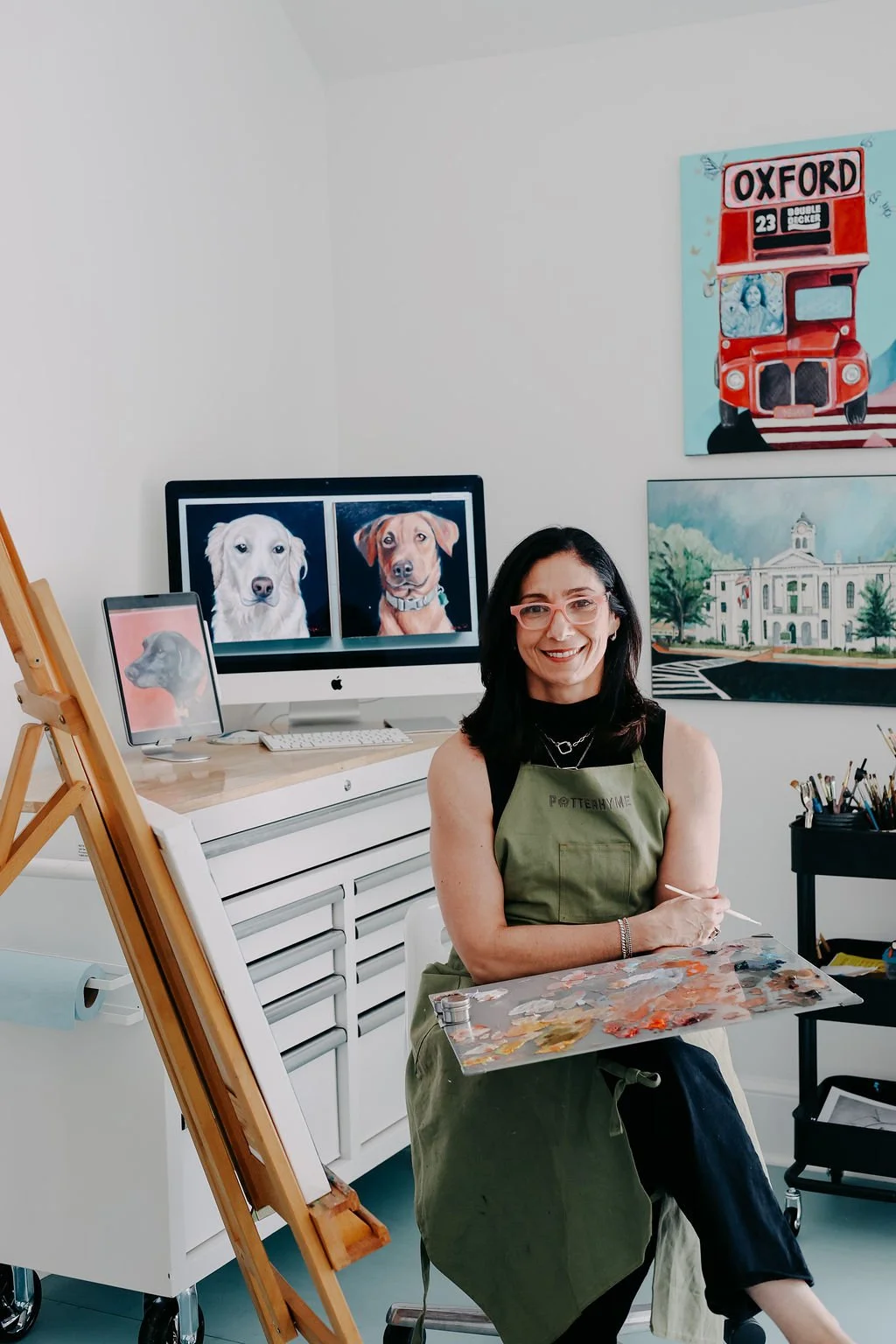 Studio LKP artist Libbie Patterson creating custom acrylic child portraits and pet portraits in her Mississippi art studio.