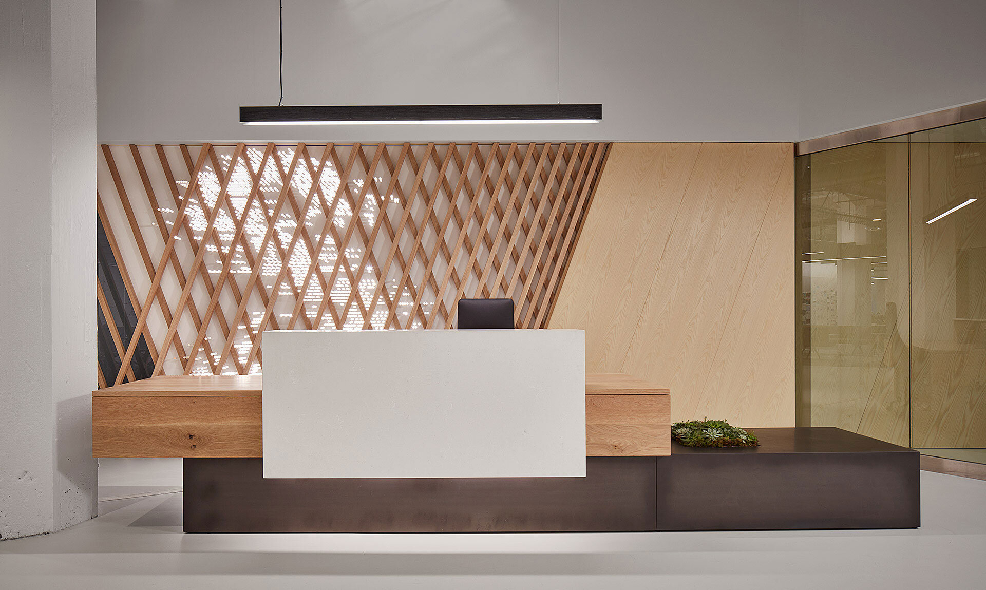 VSA Partners Reception DesksOak + steel + stone reception desk + branded oak/ash feature wall