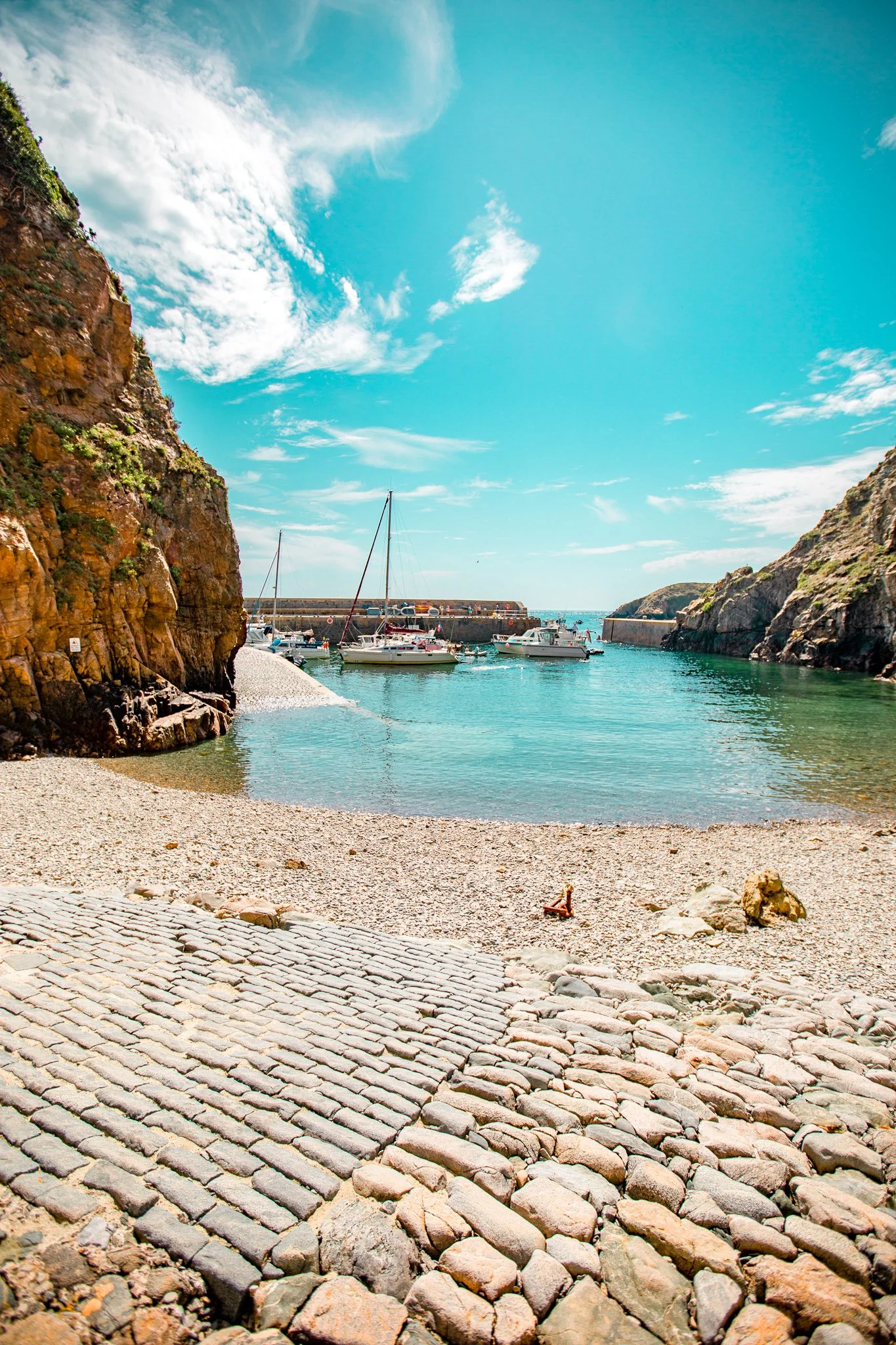 Sark harbour with boats, featured on a guided day tour from Guernsey