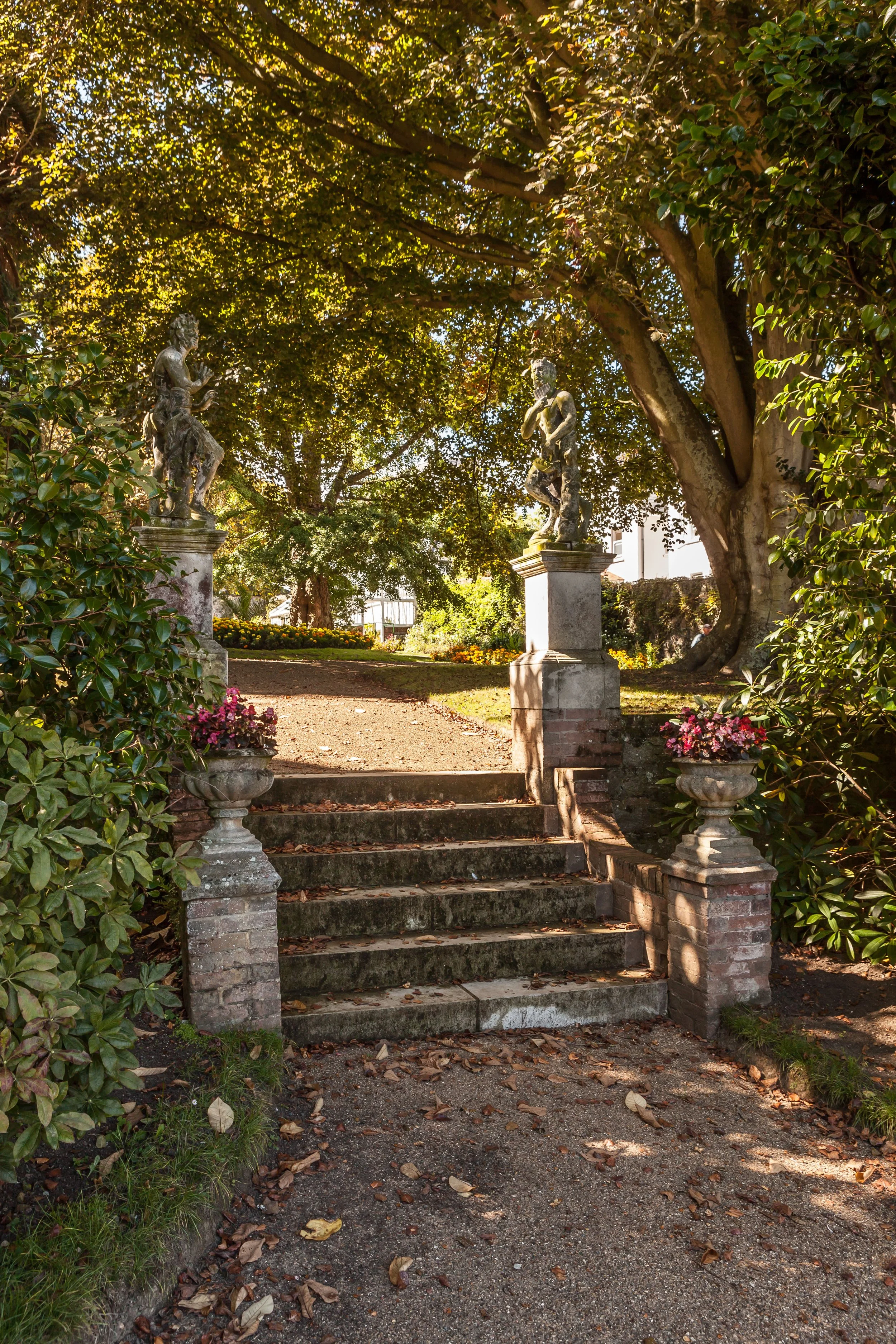 Guests strolling through Candie Gardens, Guernsey, on a scenic guided walking tour