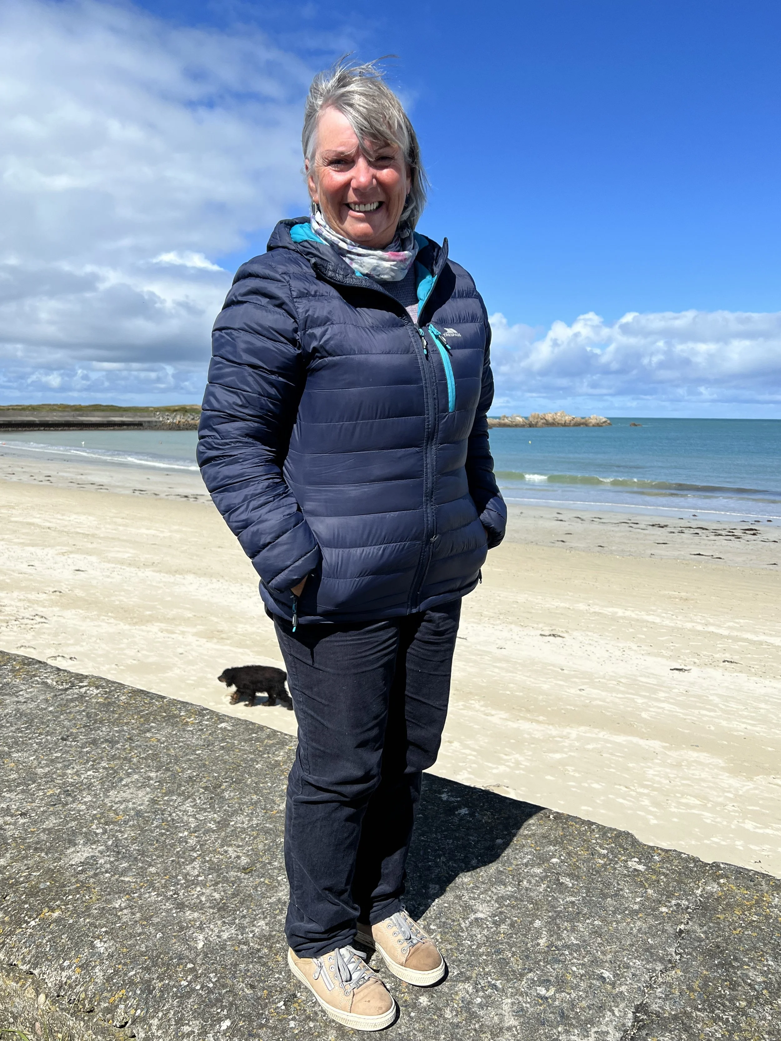 Rachel, the Silver Accredited Guernsey tour guide, smiling and ready to lead private walking and driving tours
