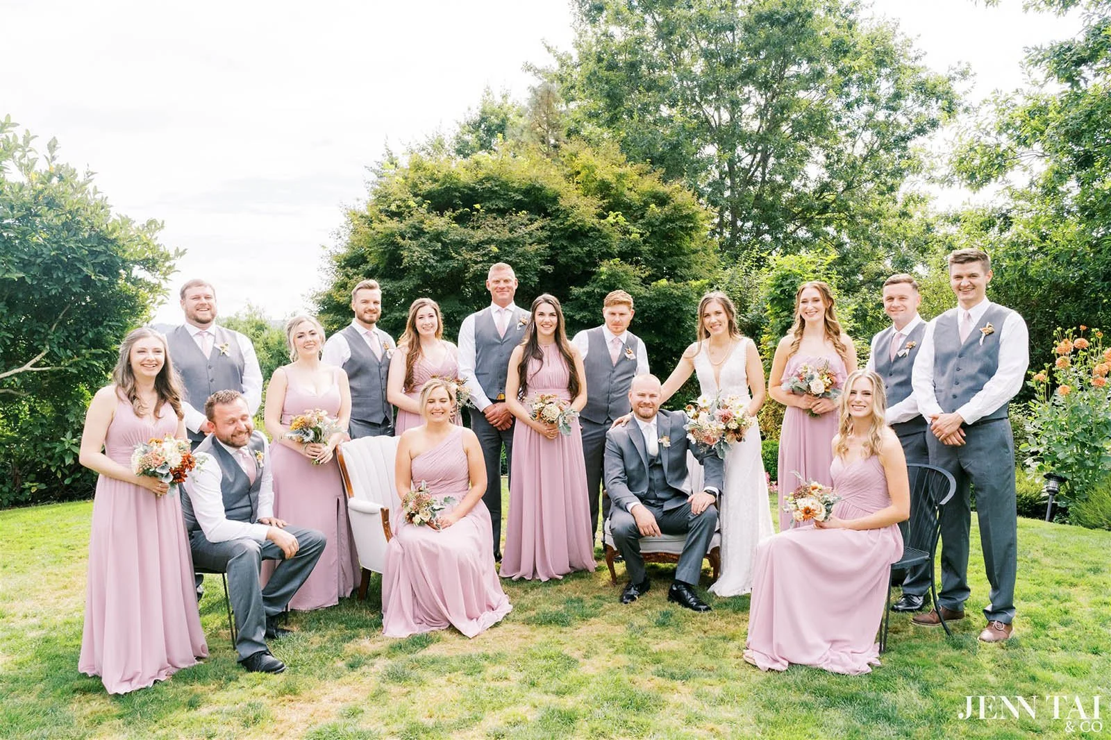 Wedding party photos on the circular lawn. Photo by Jenn Tai & Co.
