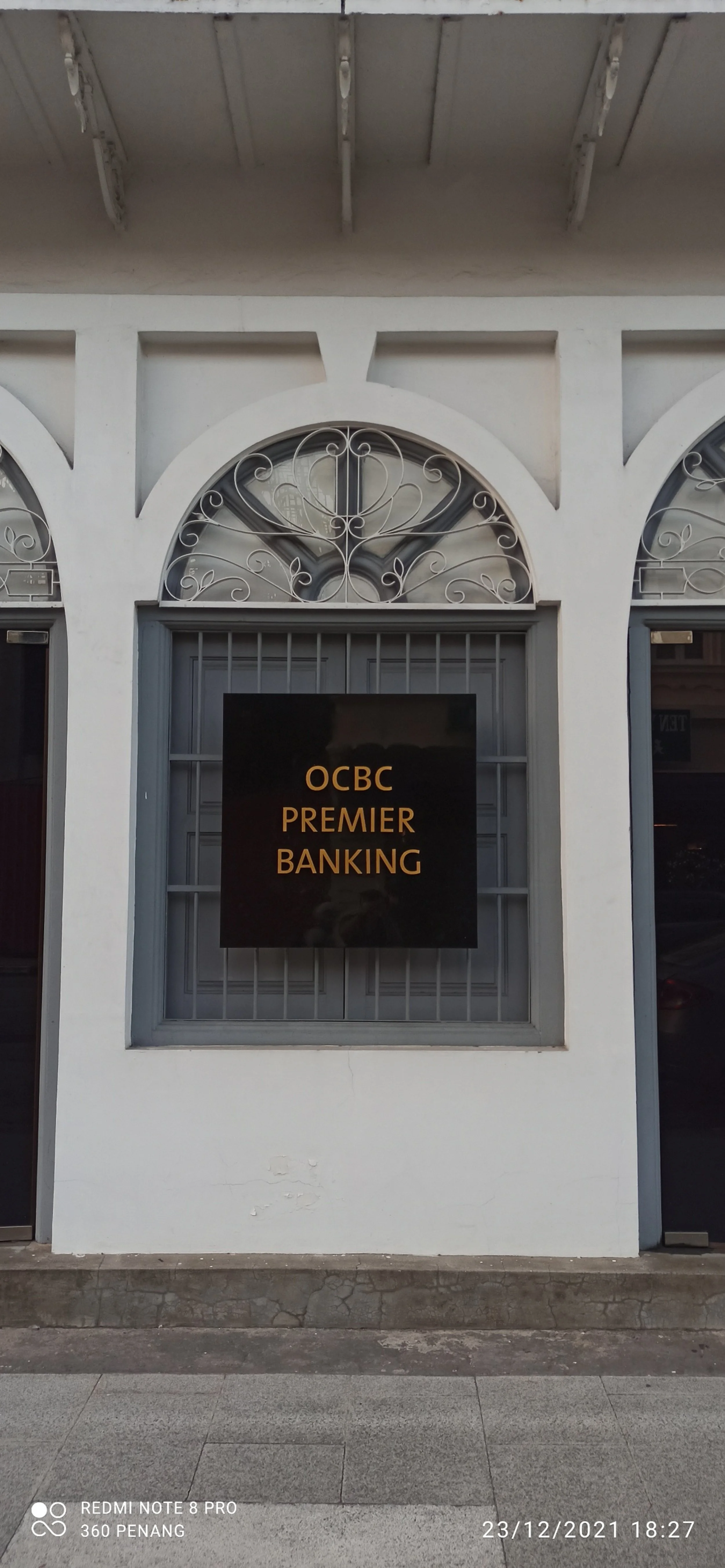 Bank building facade. Note fantail window