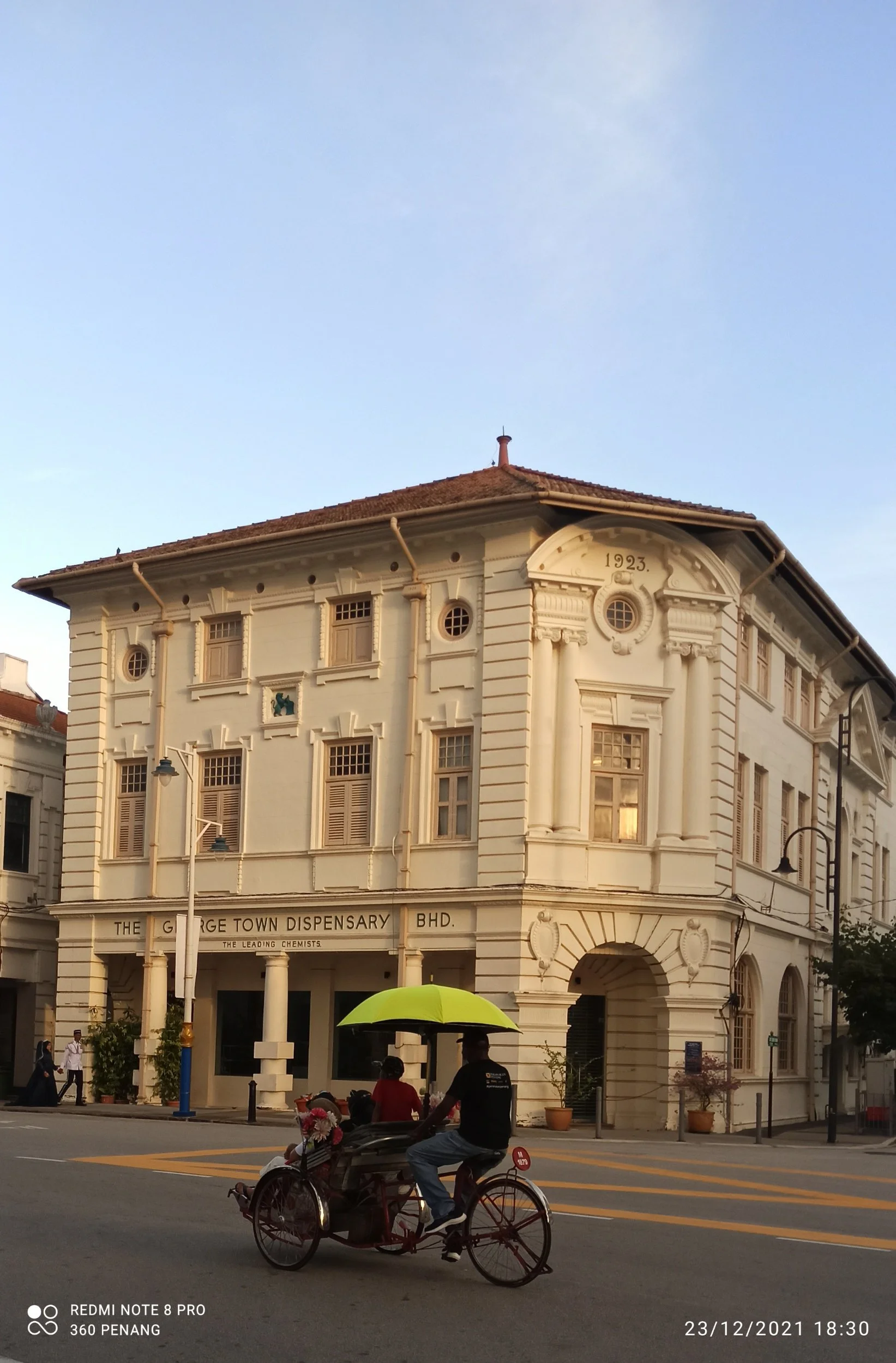 Trishaw in front of Georgetown Dispensary building