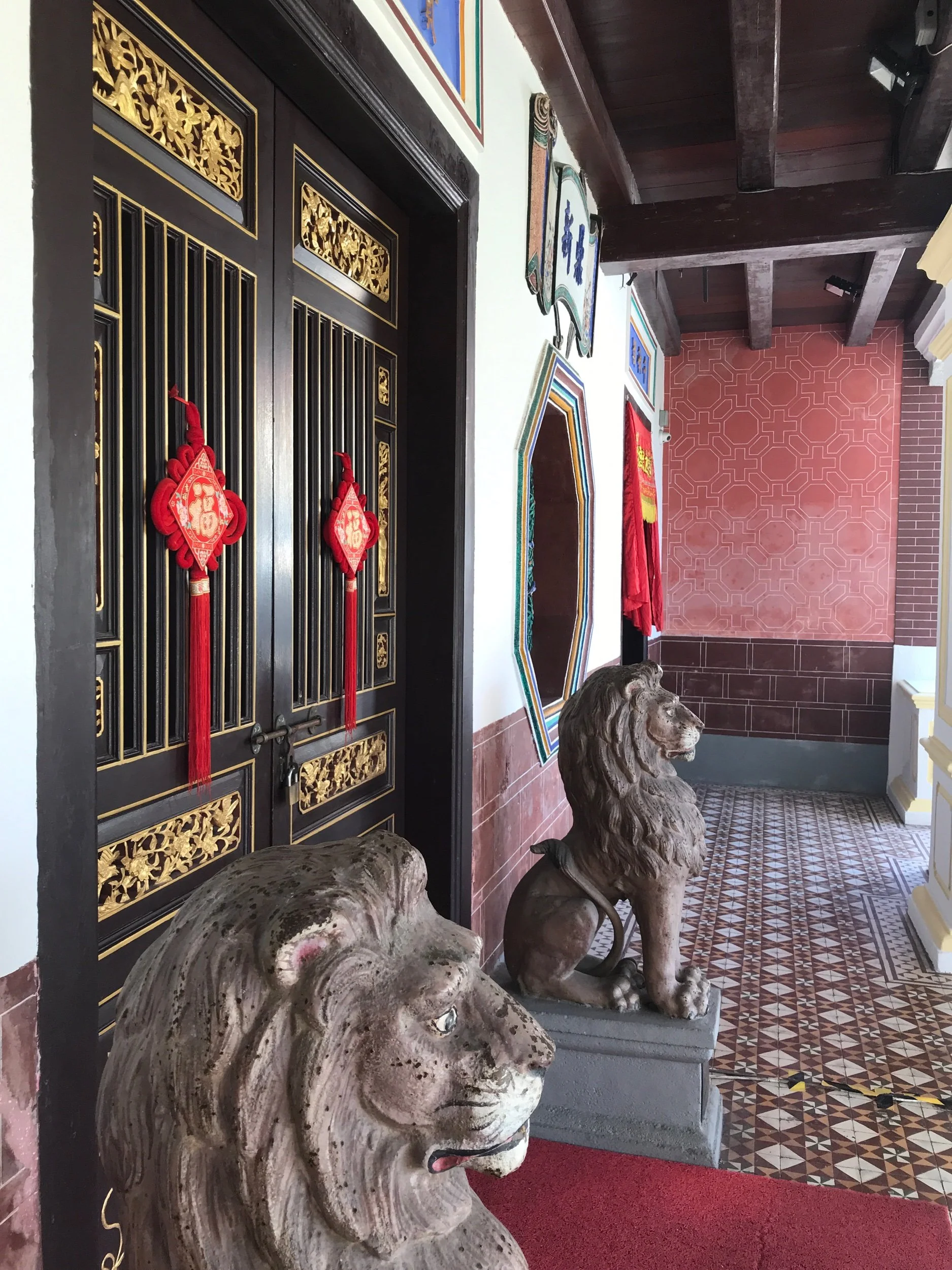 View of stone lion guardians