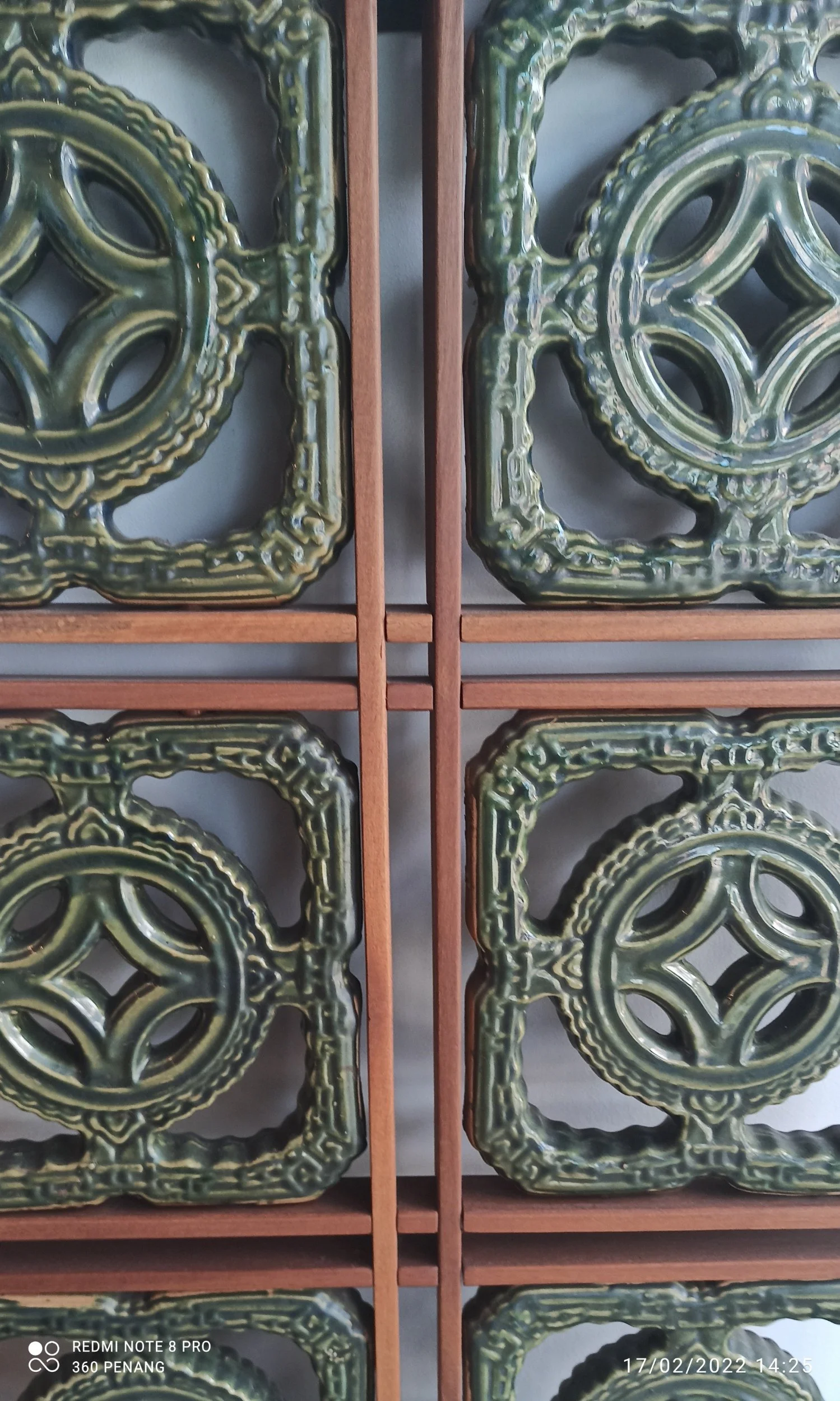 Detail of window lattices in green glaze
