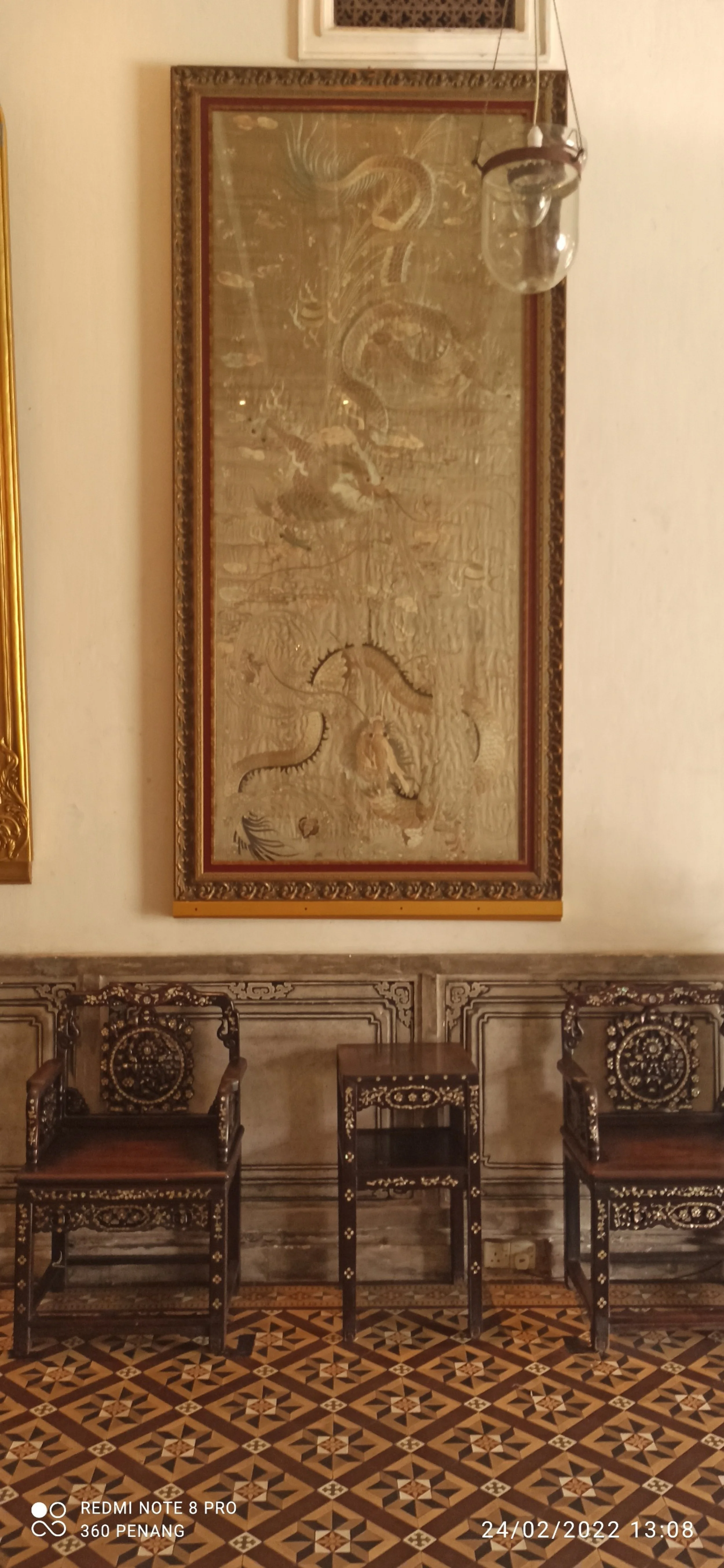 Framed tapestry in main reception hall