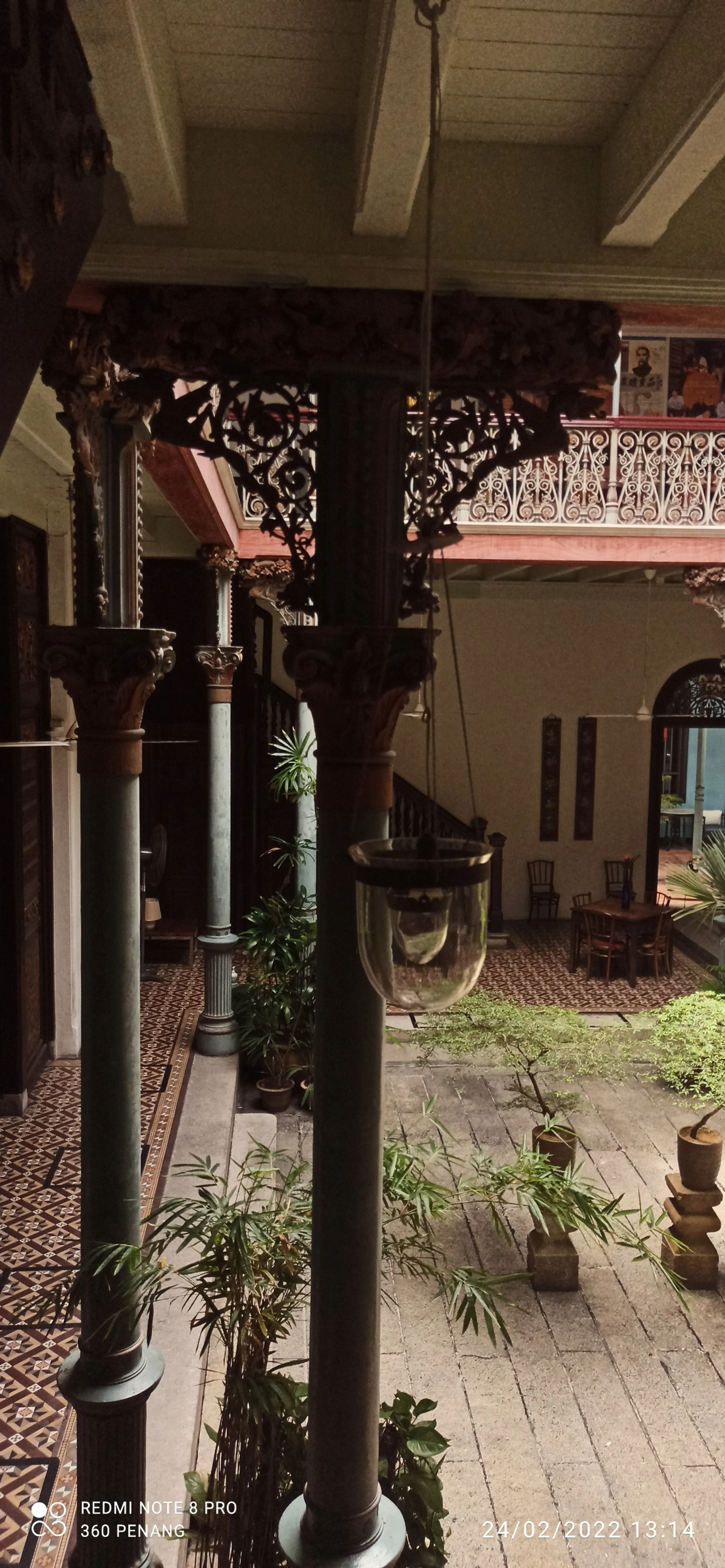View of pilasters and ornate iron decorative features wall