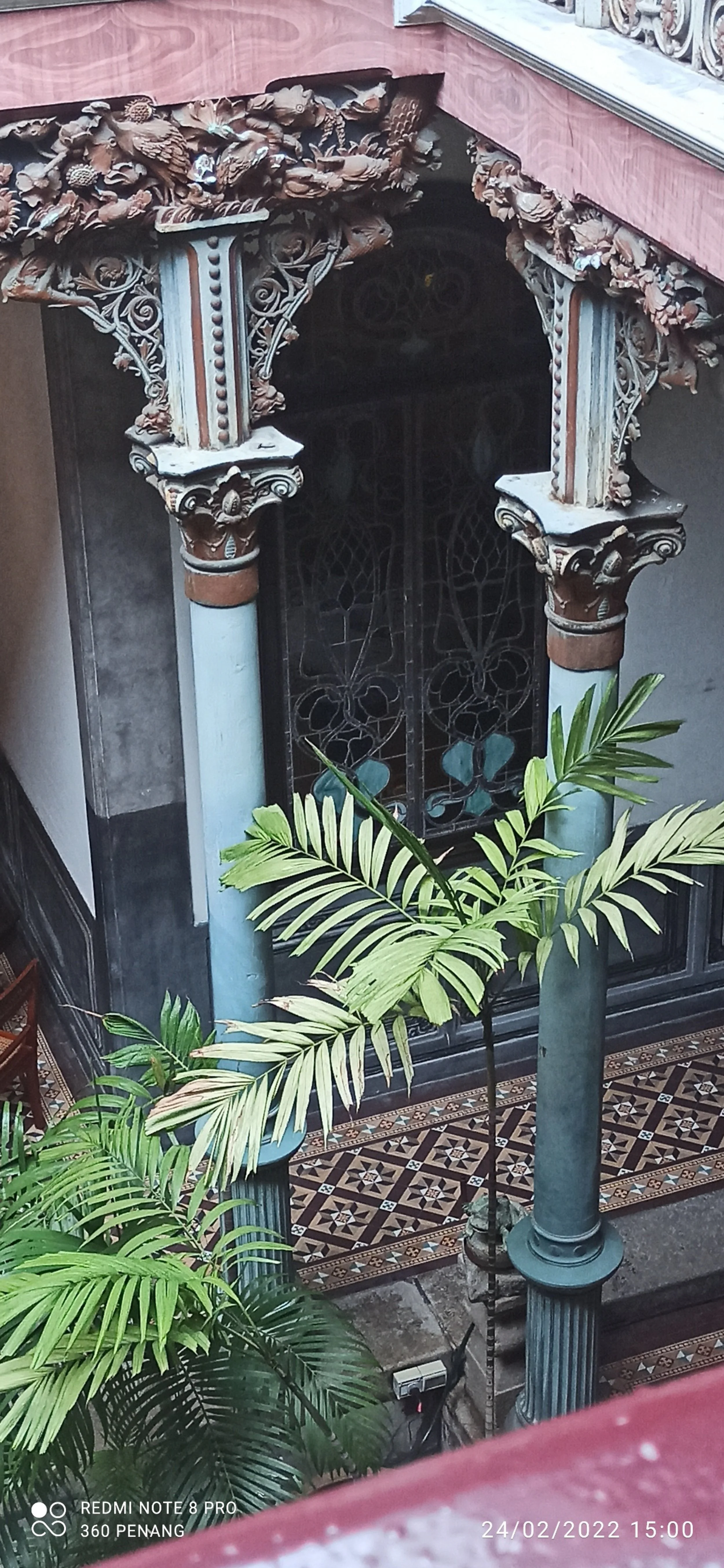 View of richly decorated ironworkon top of piladters