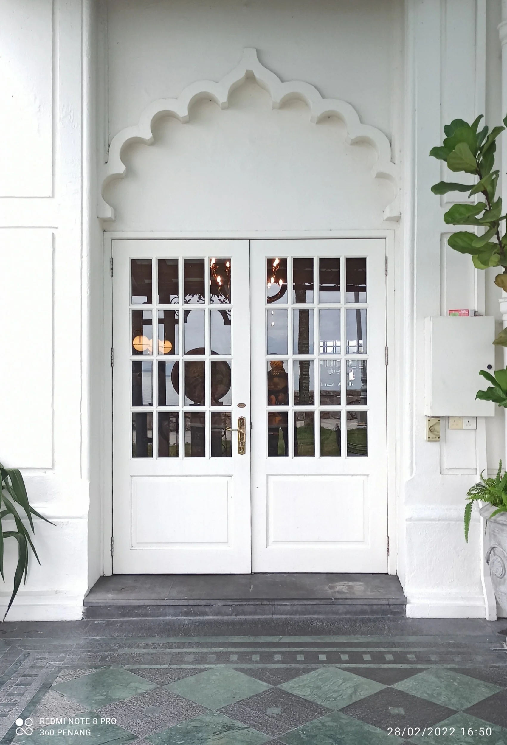 Exit to garden adjoining Palm Court