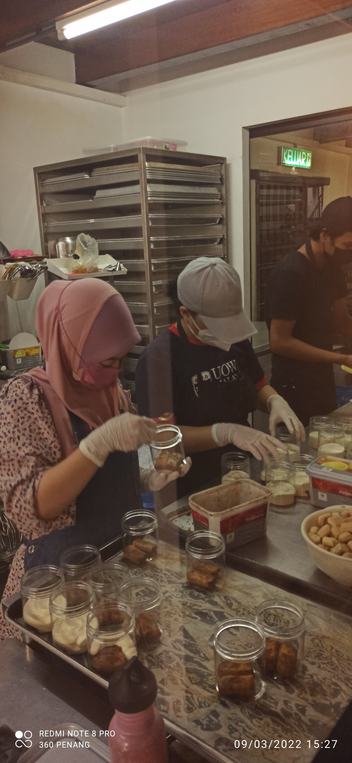 Kitchen staff preparing Tiramisù