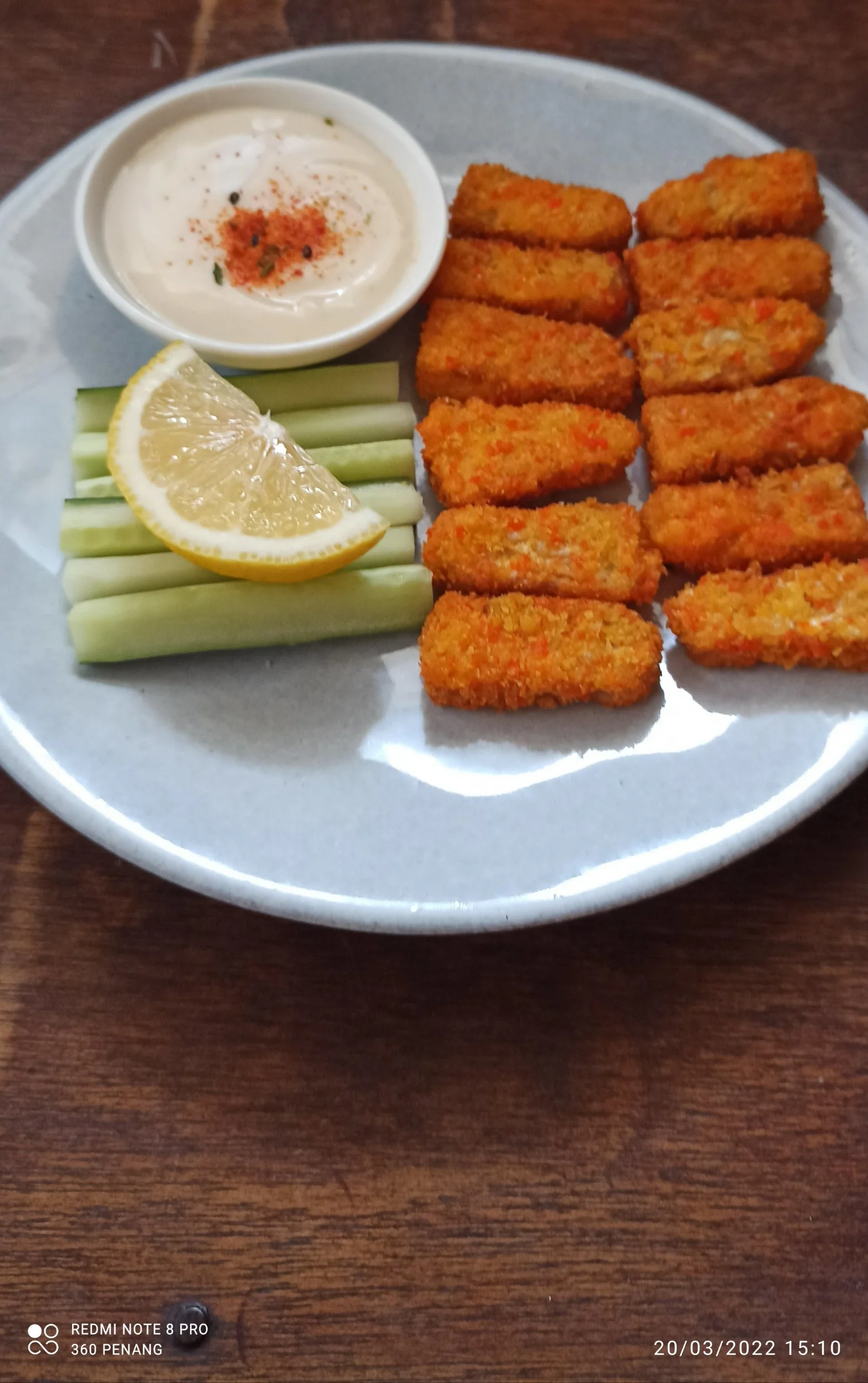 Tempeh served with a yogurt dip