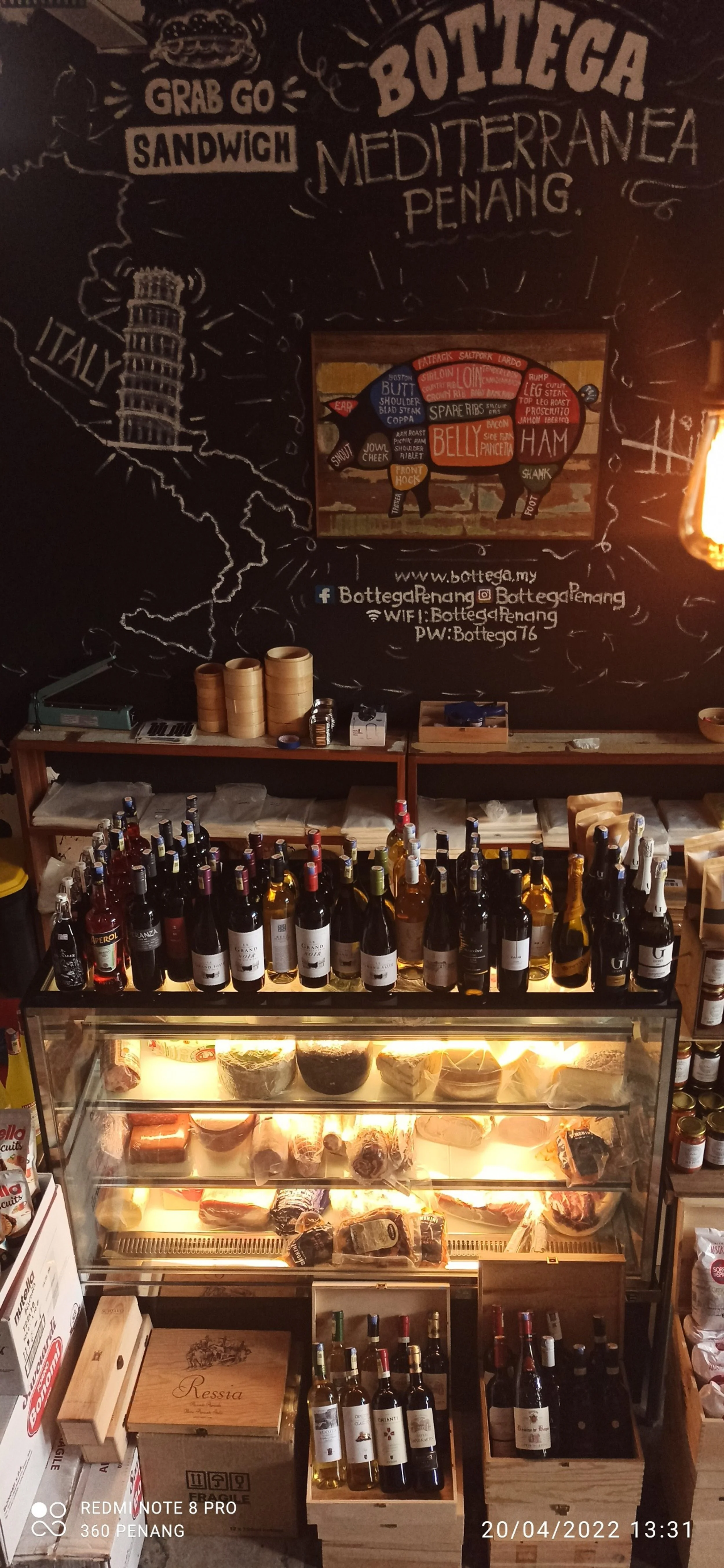 Cheese and wine for sale at the deli counter