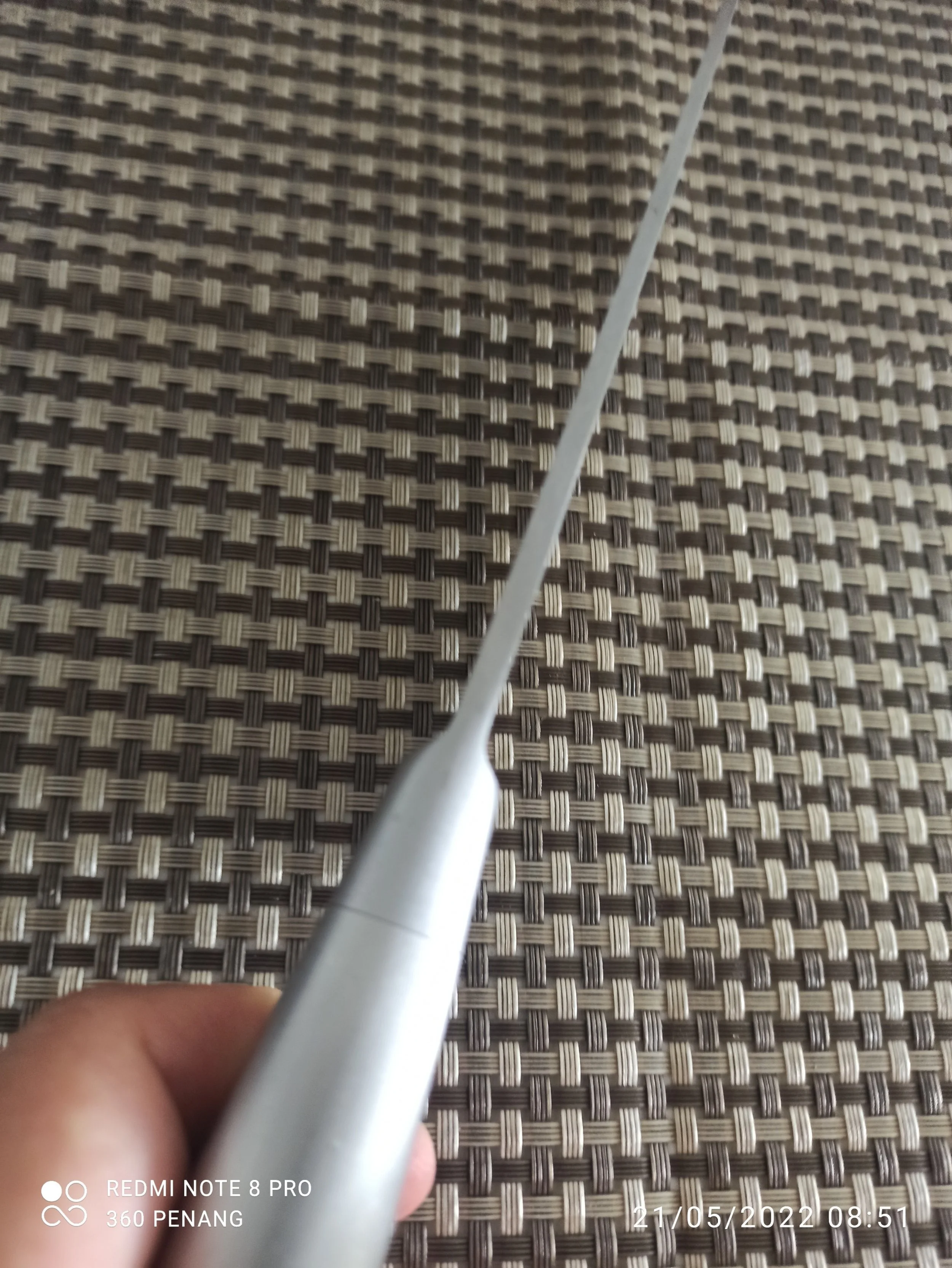 4 mm thick at the base. It's a relatively heavy knife