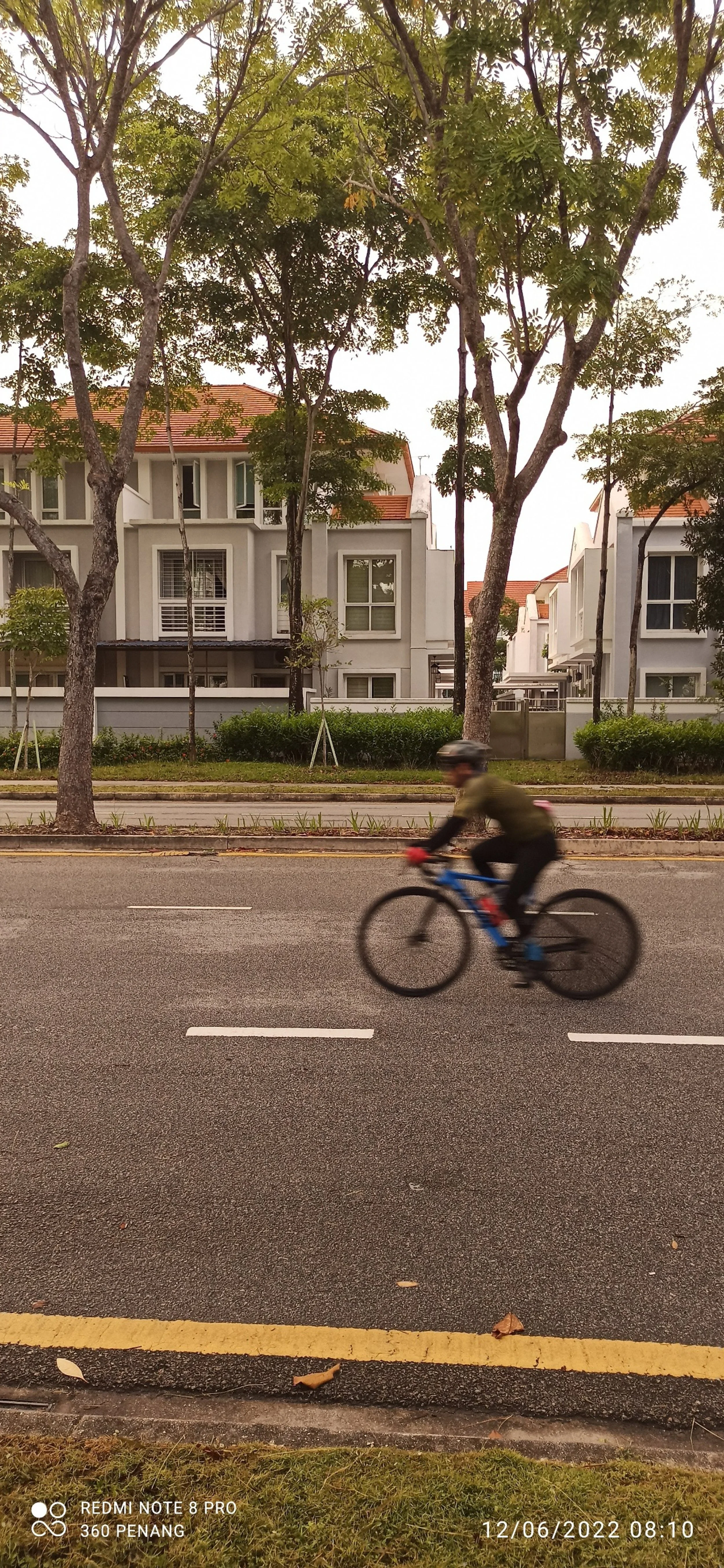 Bicyclist at Seri Tanjung Pinang road