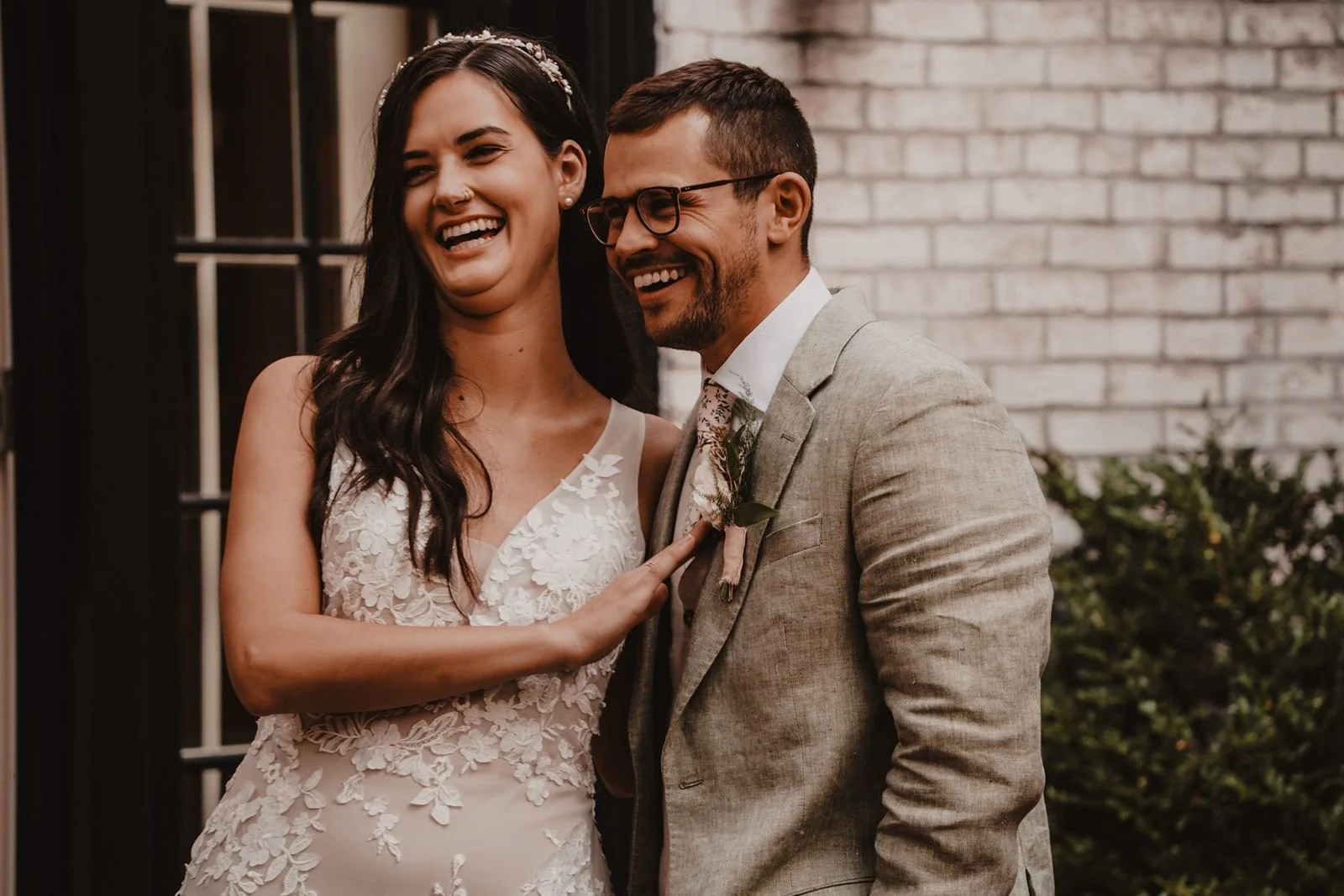 Bride-groom-laughing-wedding-reception