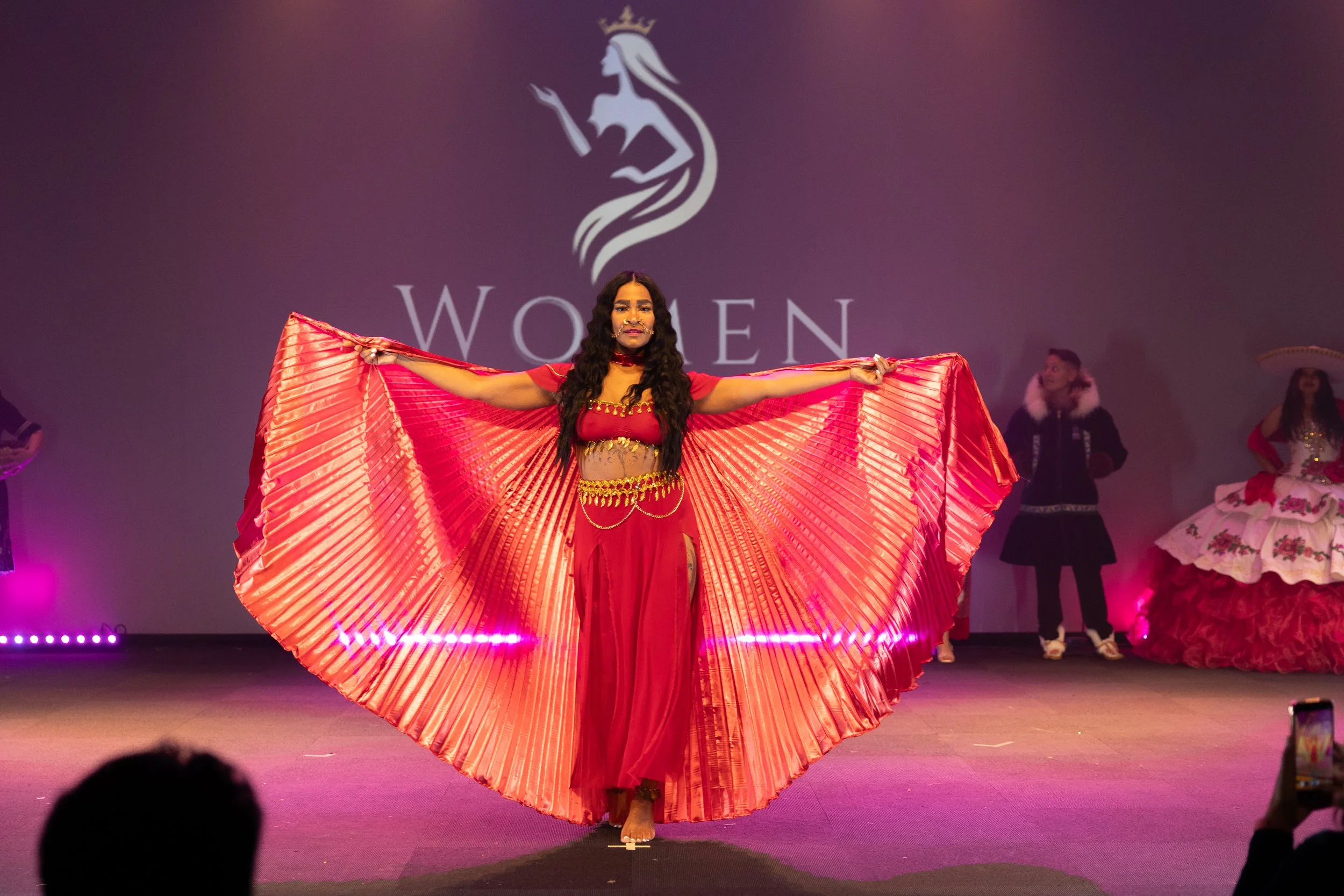 Representing Turkey, Model in traditional cultural regalia in the World of the World Fashion Show, Boss Babe Networking