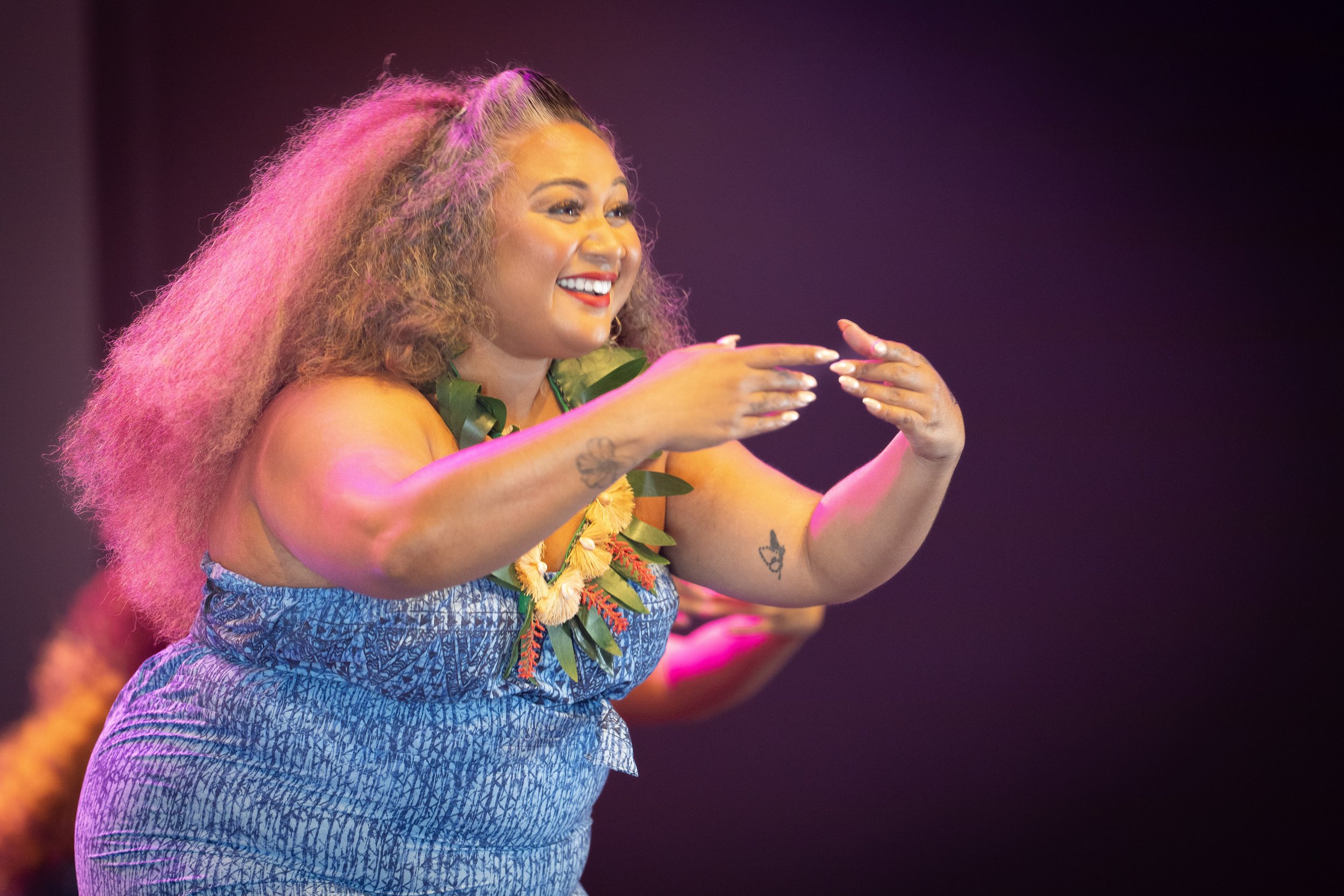 Victoria Veimau, representing the Kingdom of Tonga, from San Diego, performing in the Women of the World Fashion Show