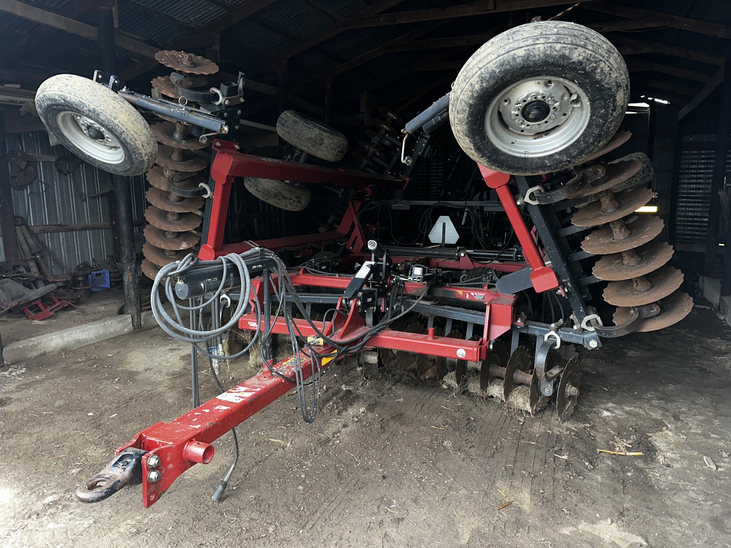 Case IH 330 TurboTill true tandem vertical tillage tool with straight bar rolling basket for sale via auction