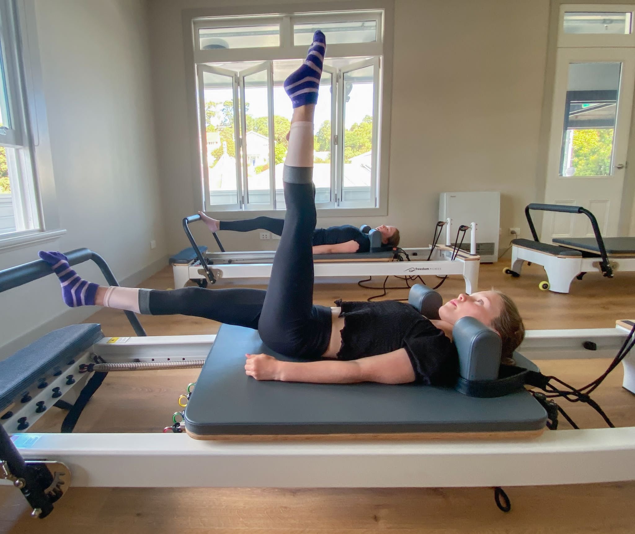 Club Pilates Boulder reformer class could be key in alleviating back pain –  Boulder Daily Camera