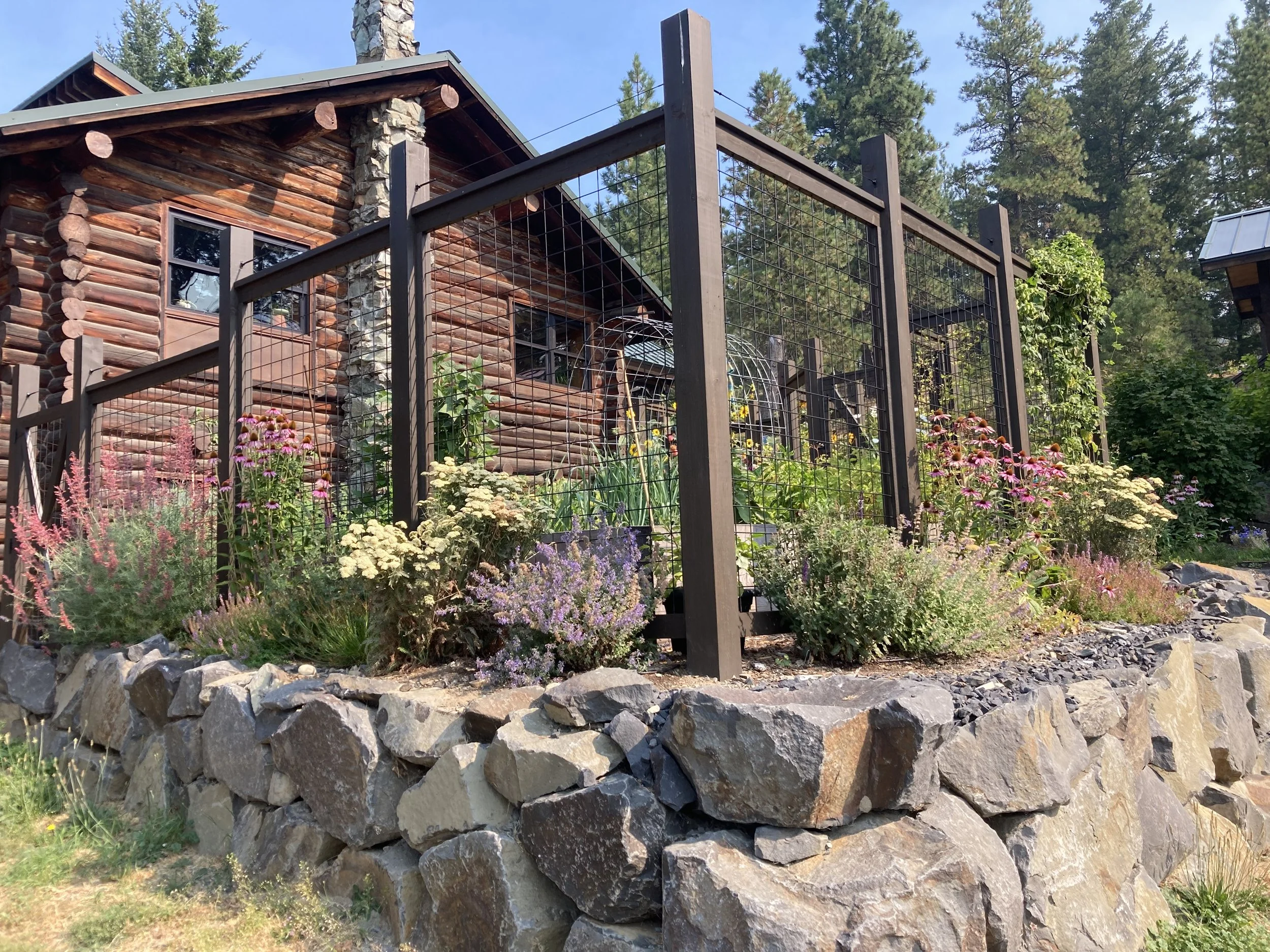 Late Summer - Drought tolerant, deer resistant perimeter garden.