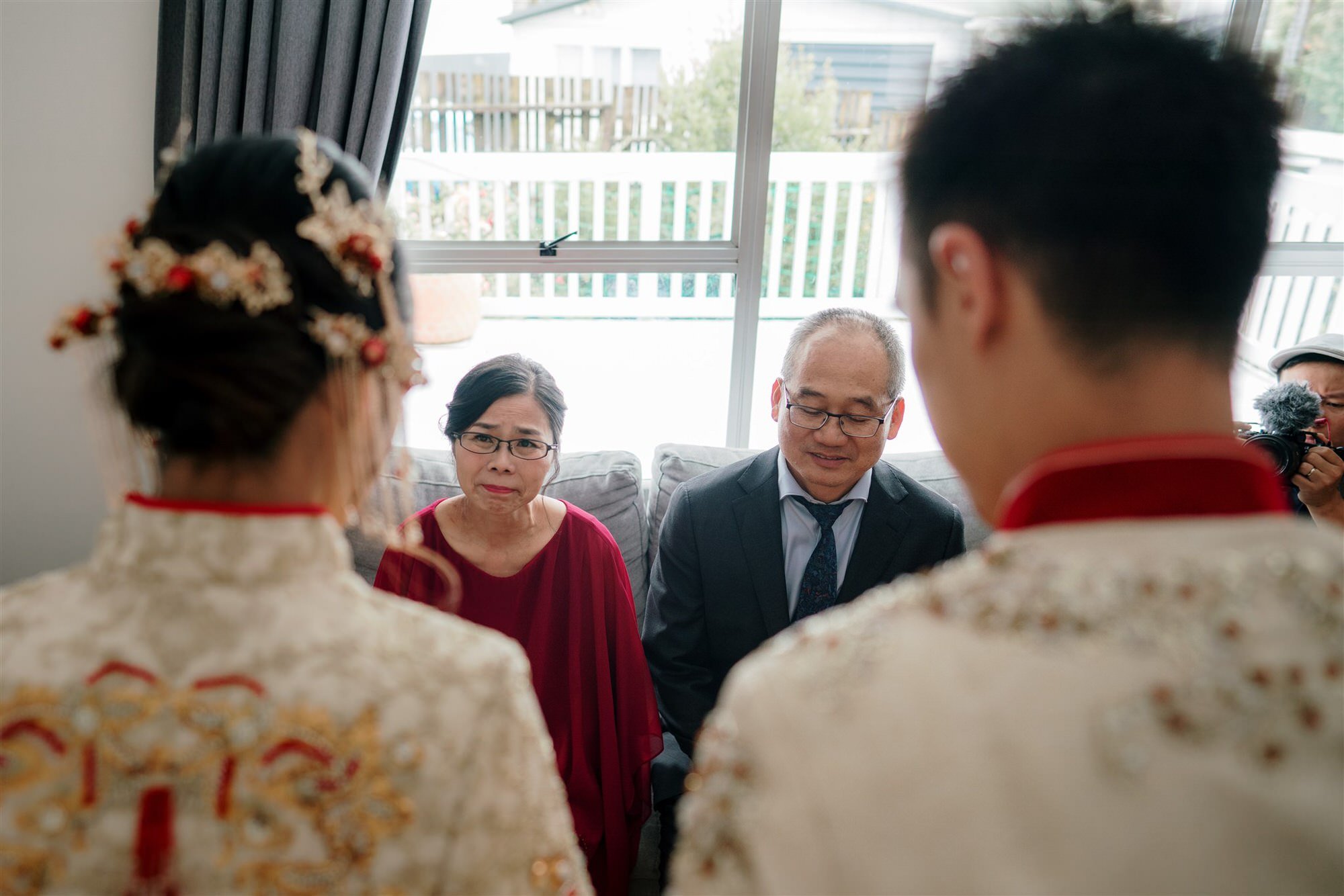 storm-best-auckland-wedding-venue-photographer-videography-dear-white-productions-natasha-tasha-bowen-rain-chinese-ceremony-qipao-tea (33).jpg
