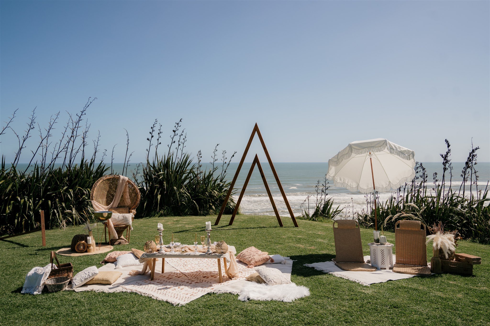 luxury-picnics-decoration-castaways-NZ-new-zealand-auckland-wedding-photographer-photography-videography-film-dear-white-productions-best-venue-waiuku-engagement-elopement-style-beach-intimate  (4).jpg