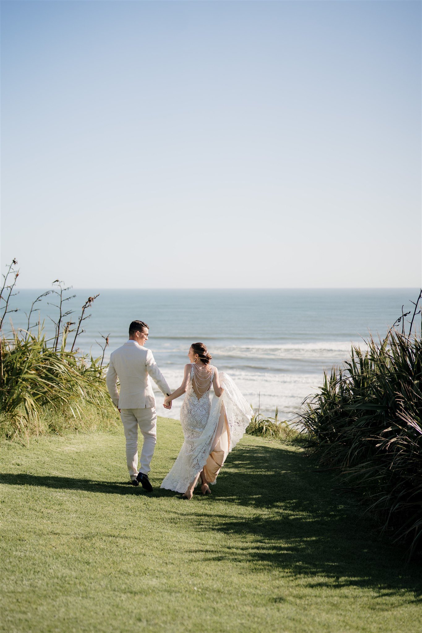 castaways-NZ-new-zealand-auckland-wedding-photographer-photography-videography-film-dear-white-productions-best-venue-waiuku-engagement-elopement-style-beach-intimate (229).jpg