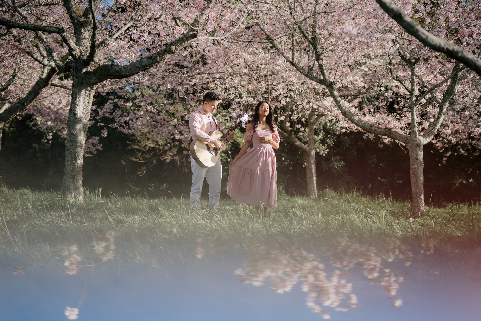 nate-and-thea-singers-duo-2023-top-auckland-wedding-phtographer-photography-videography-film-new-zealand-NZ-best-band-cherry-blossom-botanical-garden-engagement-elopement-dear-white-productions (5).jpg