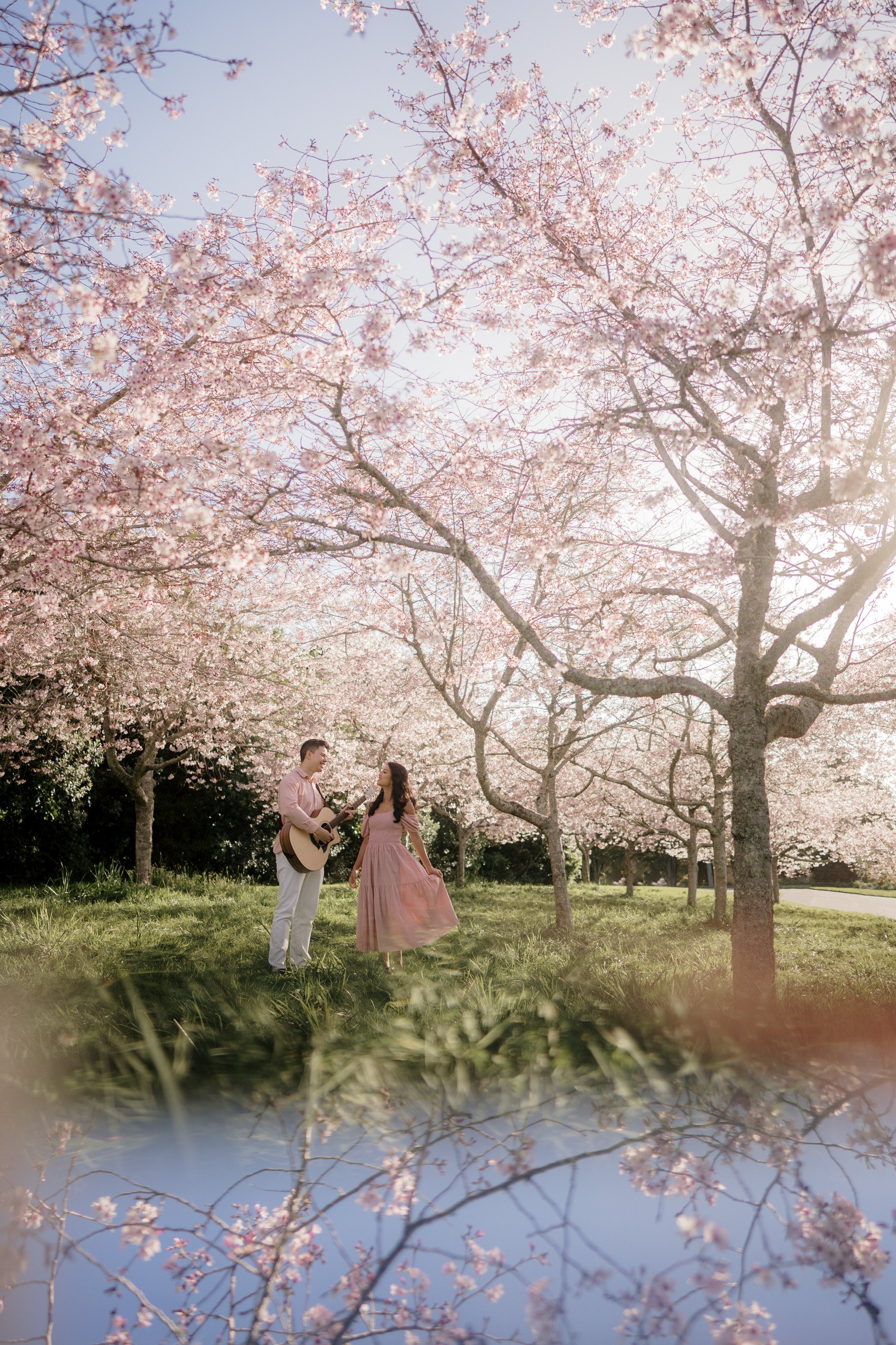 nate-and-thea-singers-duo-2023-top-auckland-wedding-phtographer-photography-videography-film-new-zealand-NZ-best-band-cherry-blossom-botanical-garden-engagement-elopement-dear-white-productions (13).jpg