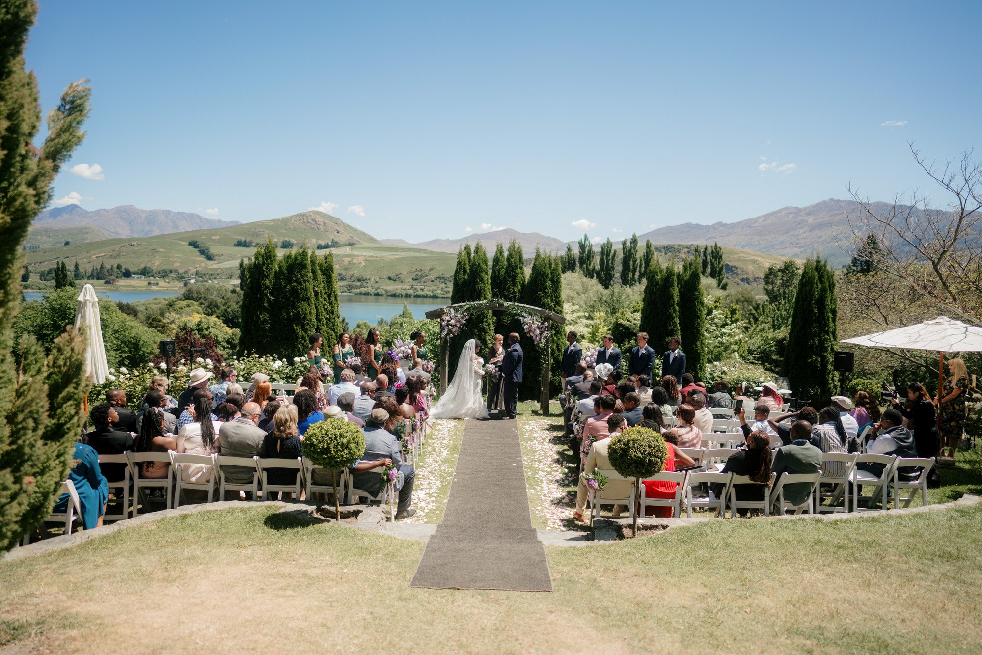 stoneridge-estate-queenstown-top-auckland-wedding-phtographer-2024-luxury-photography-videography-film-new-zealand-NZ-best-vineyard-venue-african-ceremony-heli-helicopter-elopment-dear-white-productions (22).jpg