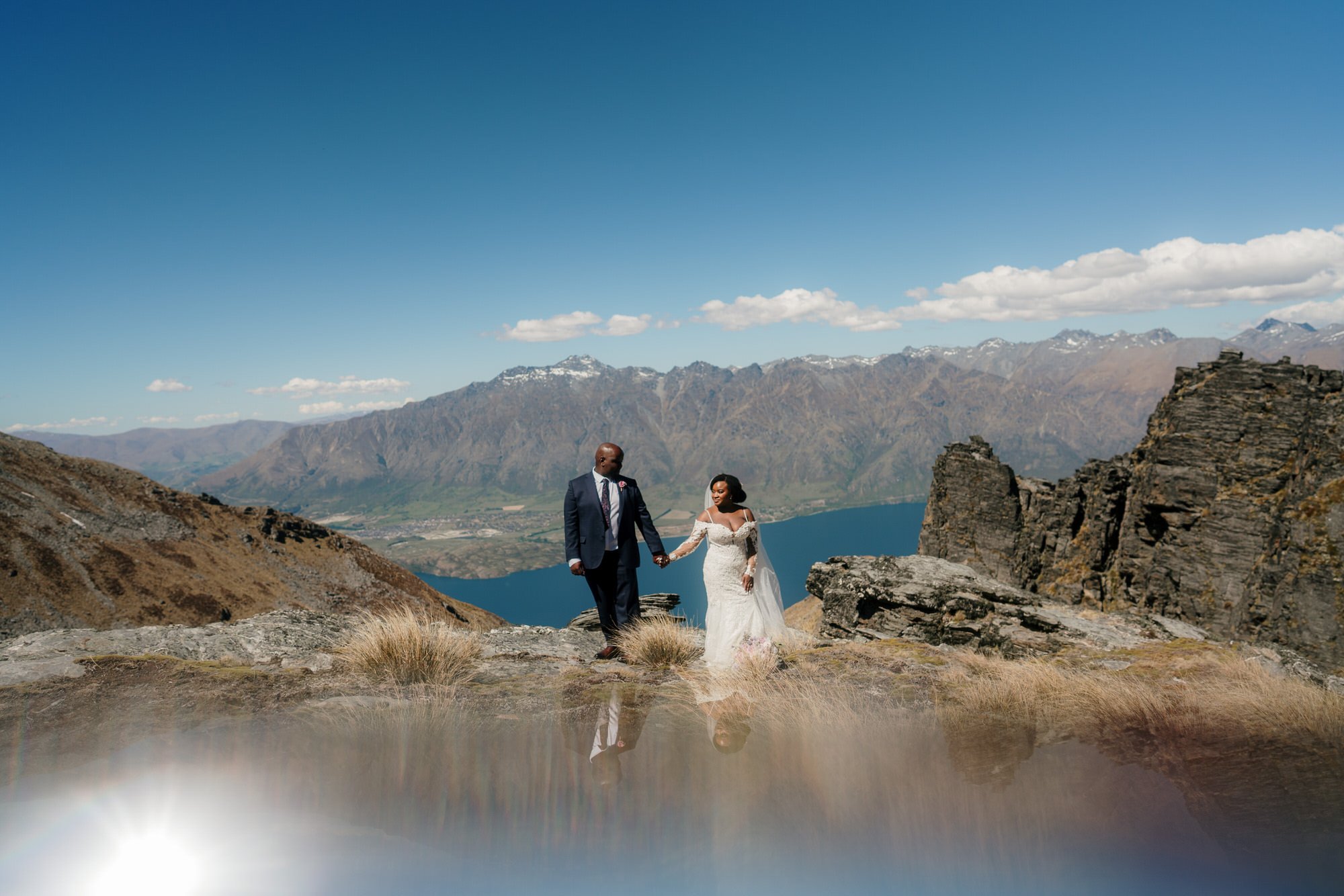stoneridge-estate-queenstown-top-auckland-wedding-phtographer-2024-luxury-photography-videography-film-new-zealand-NZ-best-vineyard-venue-african-ceremony-heli-helicopter-elopment-dear-white-productions (44).jpg