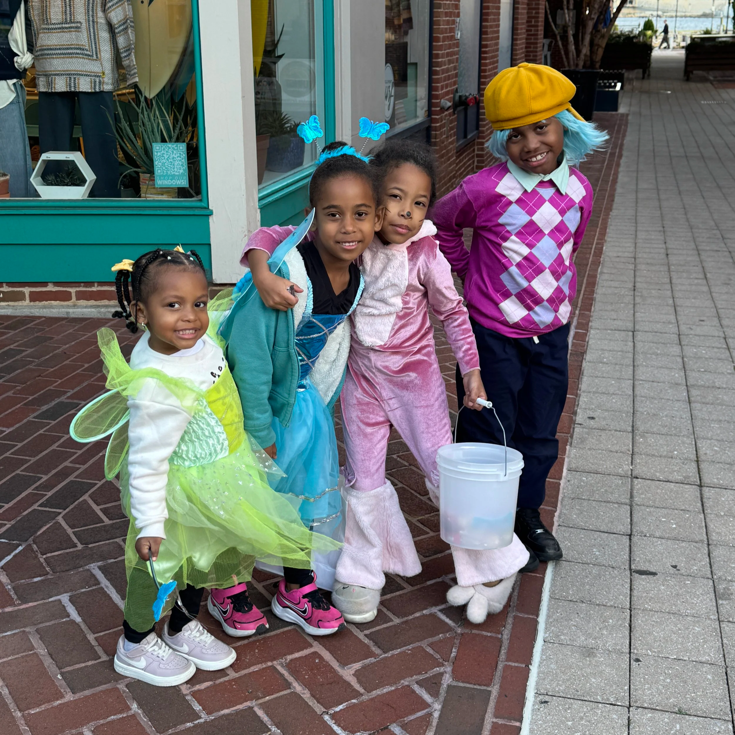 Photo of kids in costume trick or treating