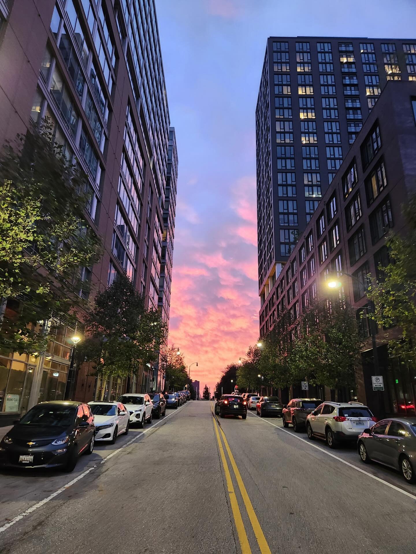 Catching the evening light showing off between the buildings of our neighbor Harbor Point. Perfect way to wind down the day. ✨ #fellspointmainstreet #fellspoint #harborpoint #baltimore
