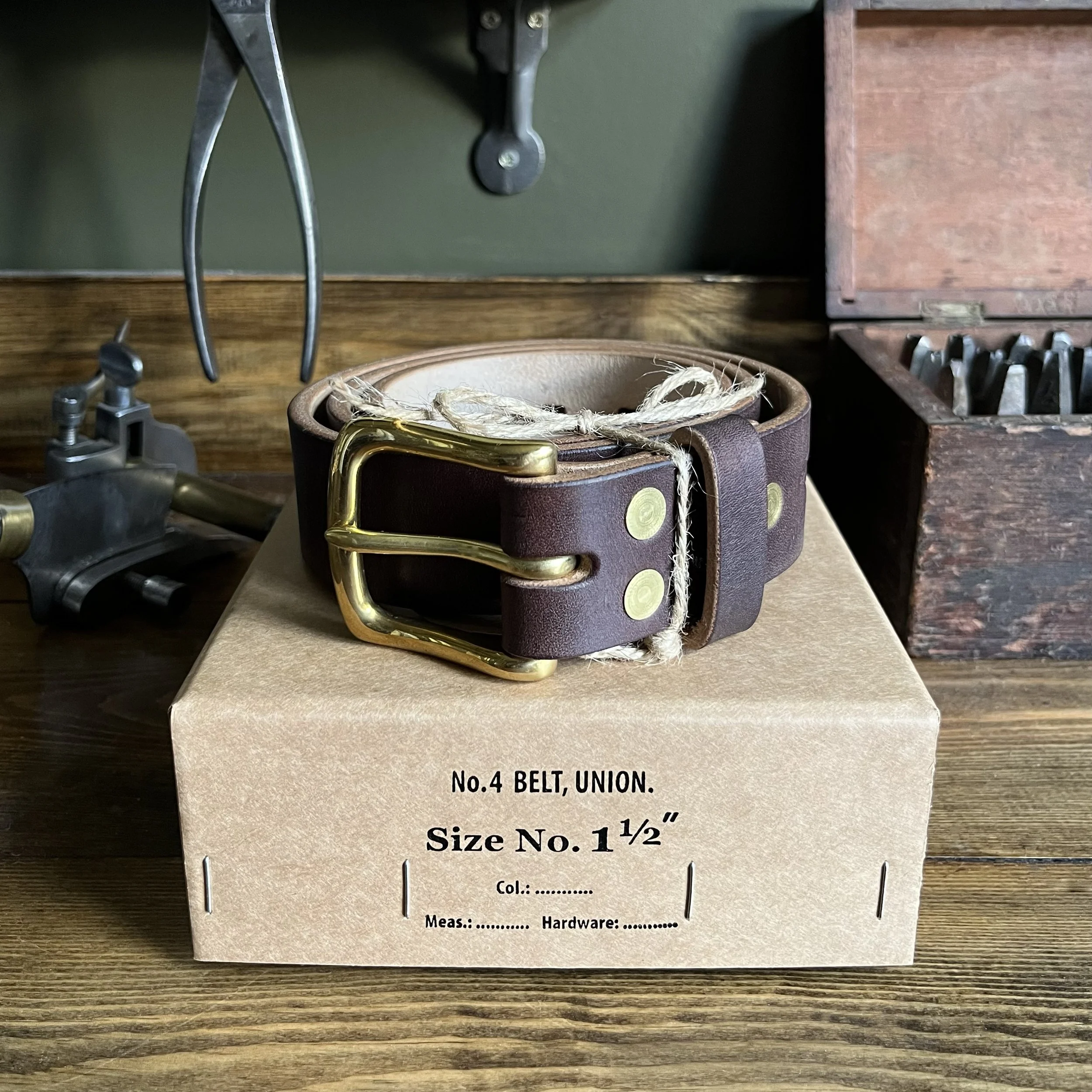 Handmade Leather Belt with Brass buckle on Vintage Box
