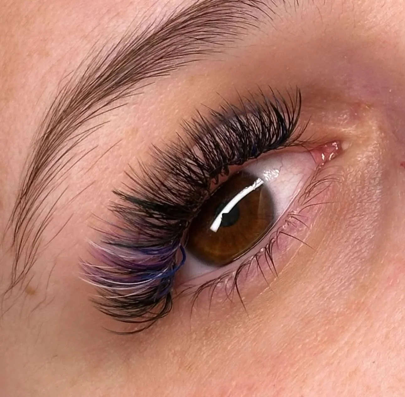 A subtle pop of color in your lash extensions is the perfect way to freshen up your look without going over the top. Think soft blues, violets, or a hint of emerald woven into your classic set for that little extra something when the light hits. Read