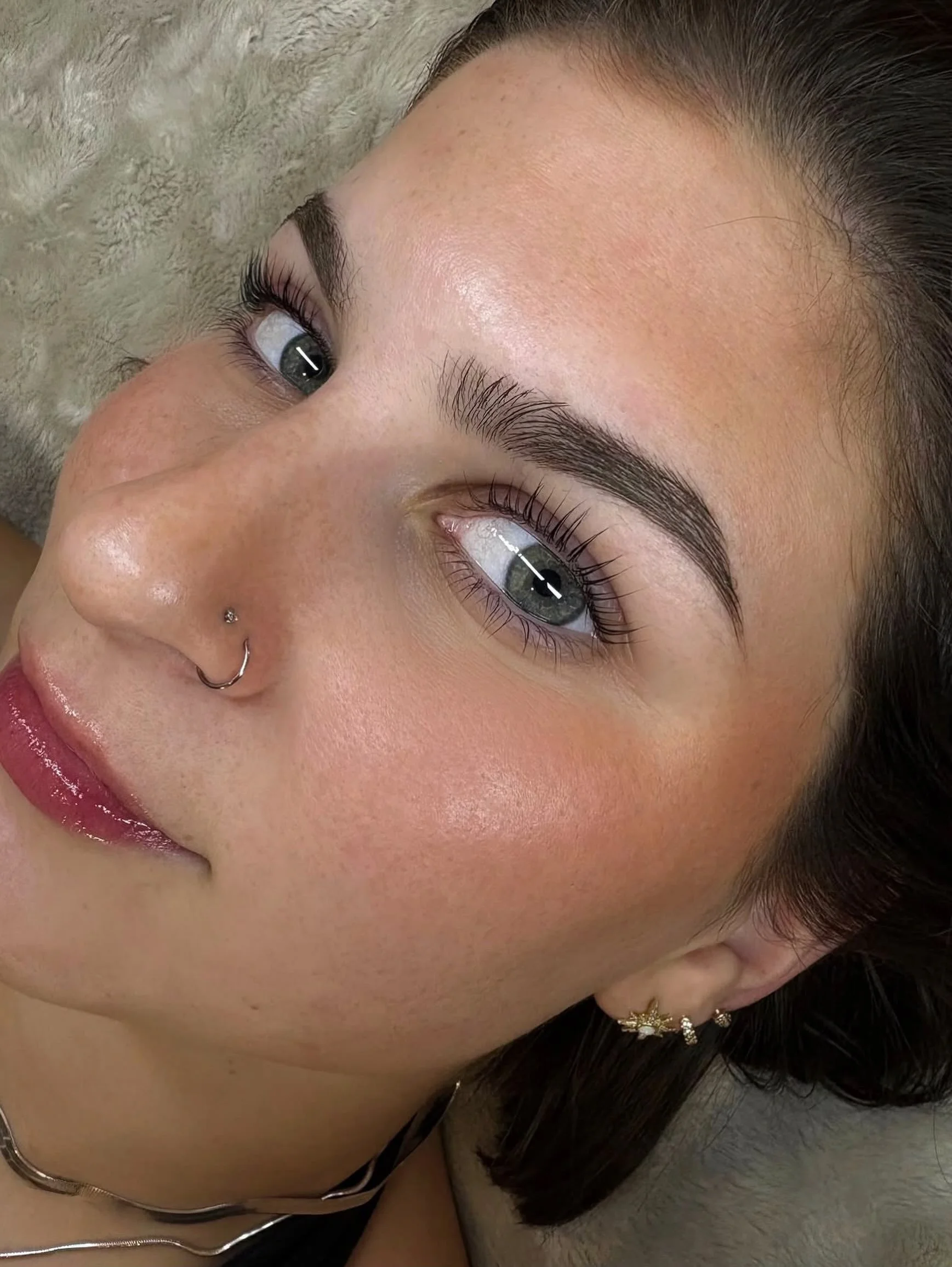 Wake up, blink, done. Our lash lift and tint gives you that just-mascaraed look without the mascara &mdash; curled, dark, and full of life from the moment your alarm goes off. No clumps, no smudges, no 10-minute mirror negotiations. Just you, but mor