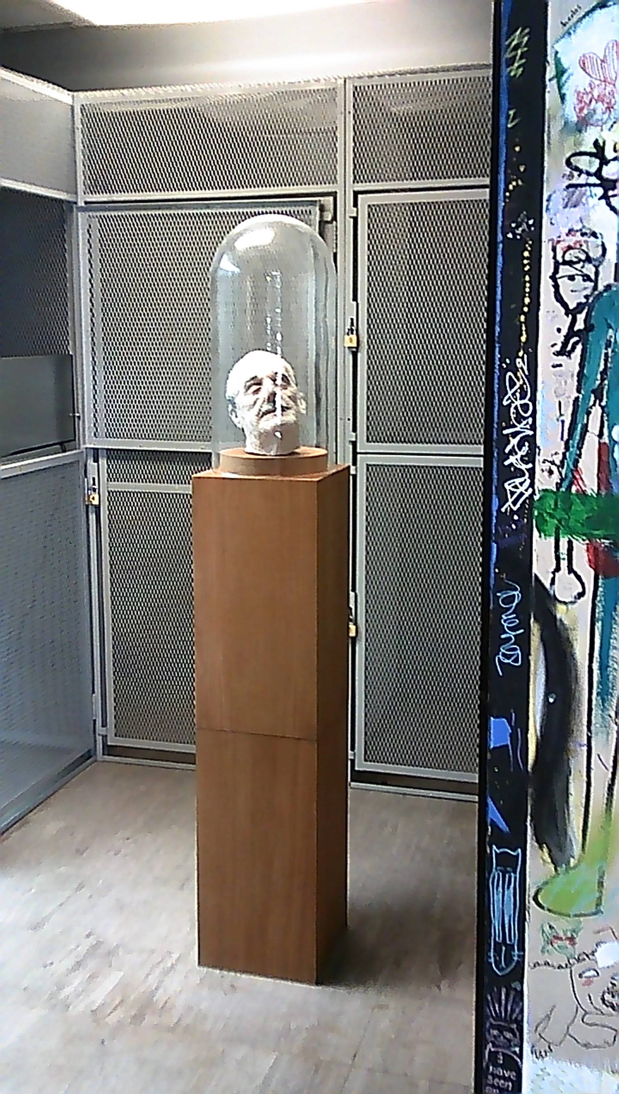 V.I.T.R.I.O.L. (cryonized head of Walt Disney), 2019
foam, latex, acrylic, synthetic hair, wood, glass