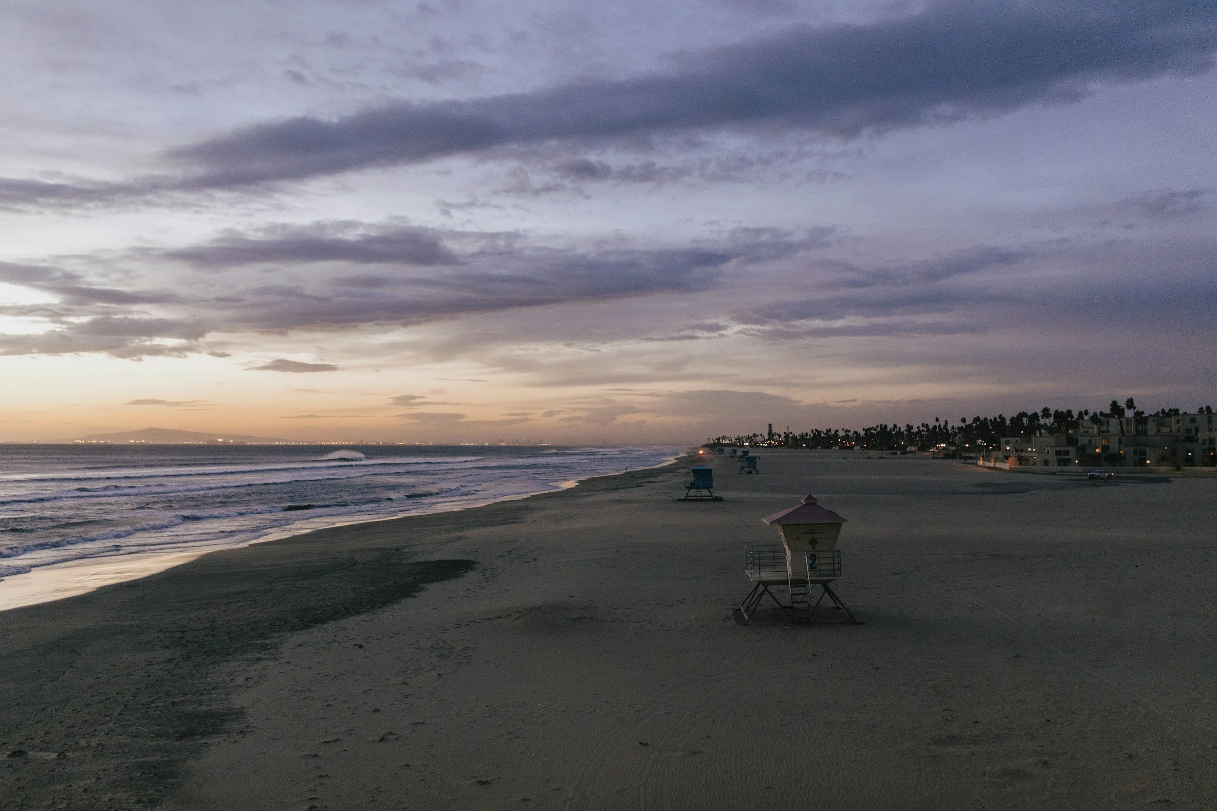 Huntington Beach image from shoreline of sunset over beach