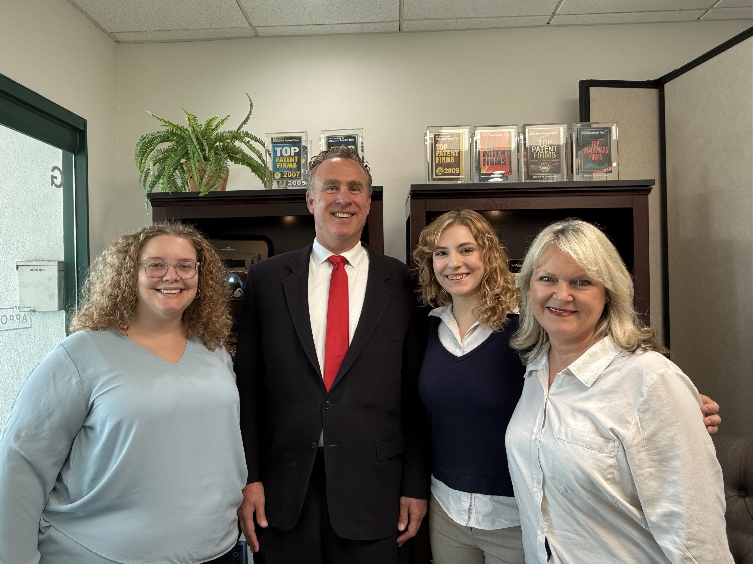 Eric Karich with his intellectual property legal team at Karich & Associates in Huntington Beach, California