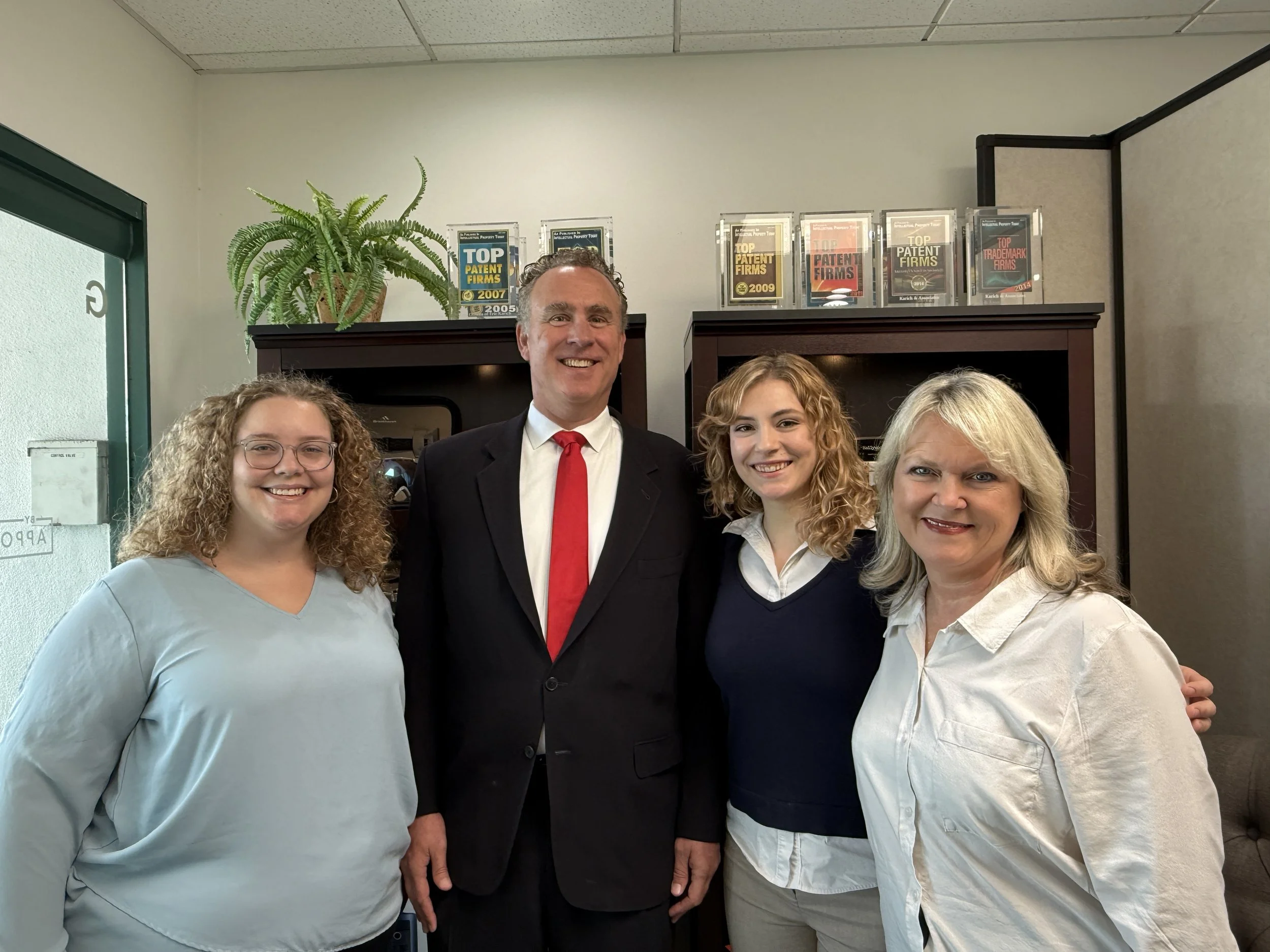 Eric Karich with his intellectual property legal team at Karich & Associates in Huntington Beach, California