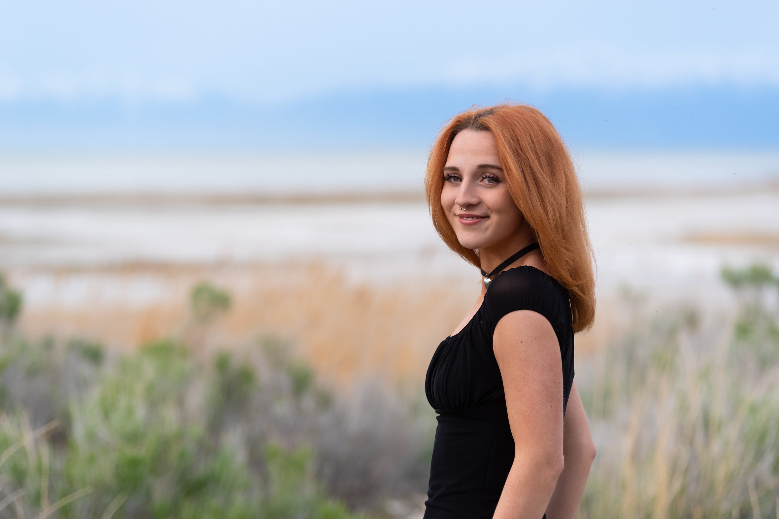 A high school senior girl at the Utah Great Salt Lake at Golden Hour